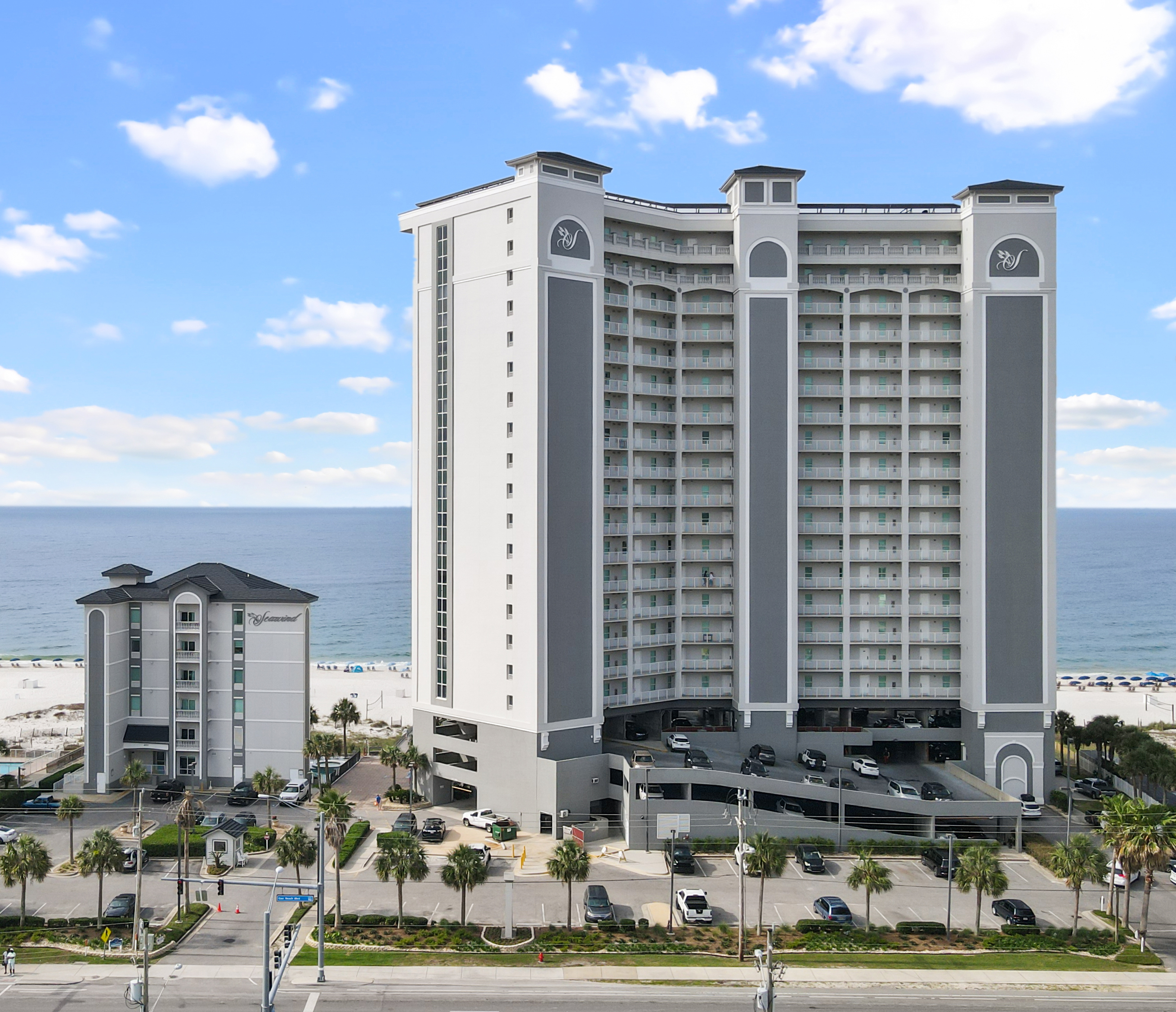Arrival landmark: Use the tall Seawind tower on the right, which includes the parking garage. The shorter Seawind building is shown on the left only for comparison.
