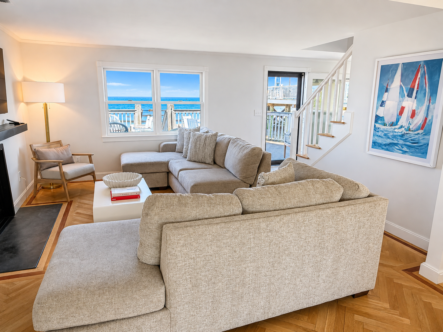 Bright, comfortable living space with ocean views and plenty of room to relax after a day at the beach.