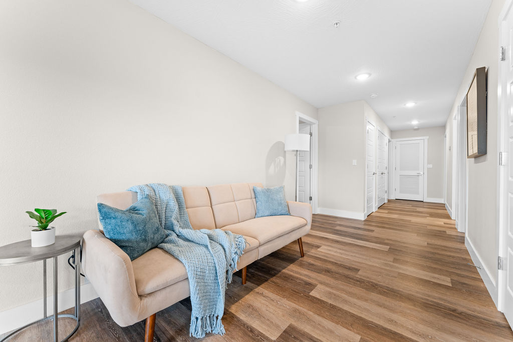 Extra futon sleeping in lower level game area