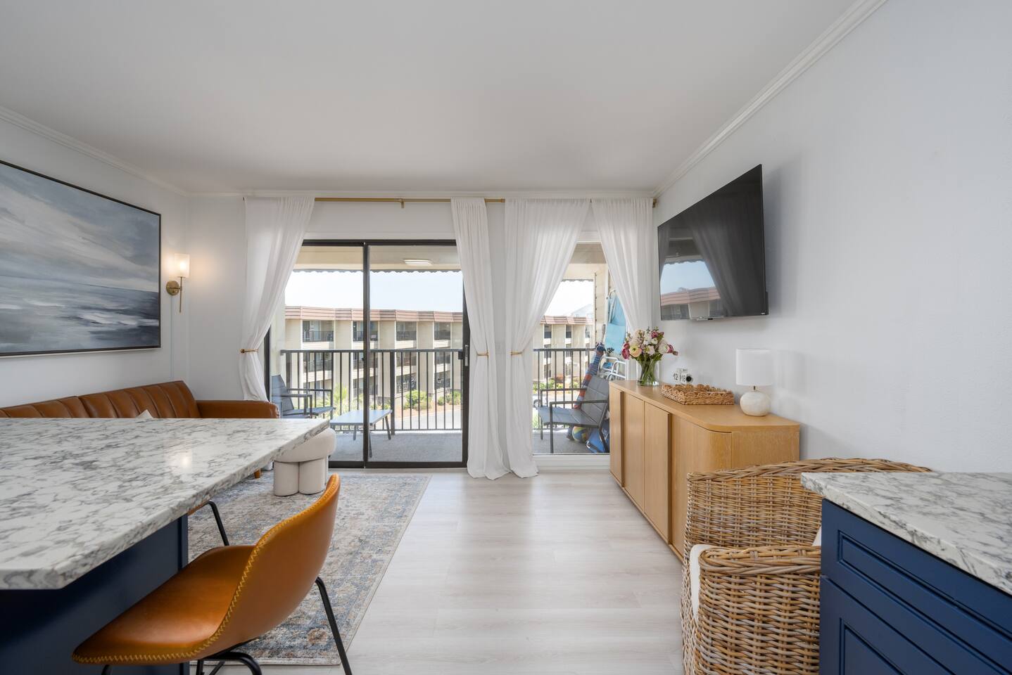 View of the balcony located off of the Kitchen and Living room.