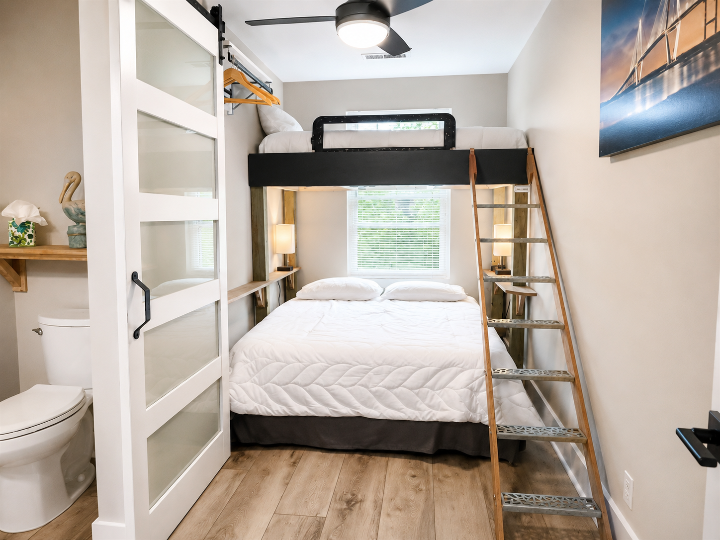 Second bedroom with half bath, queen and twin bunks