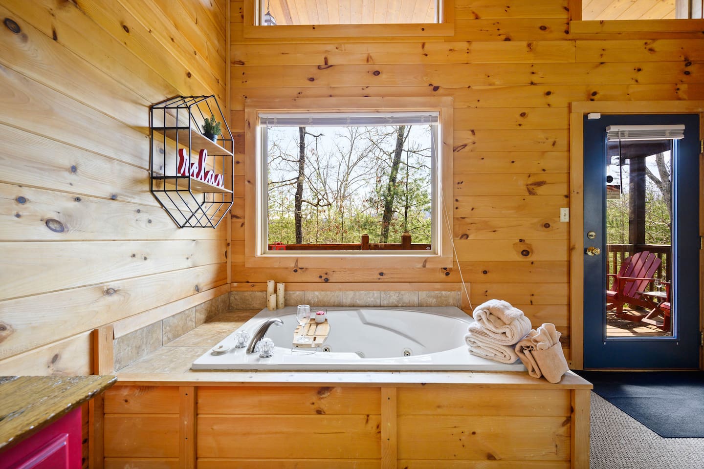 Tall ceilings, an exit to the back patio and hot tub, just perfect.
