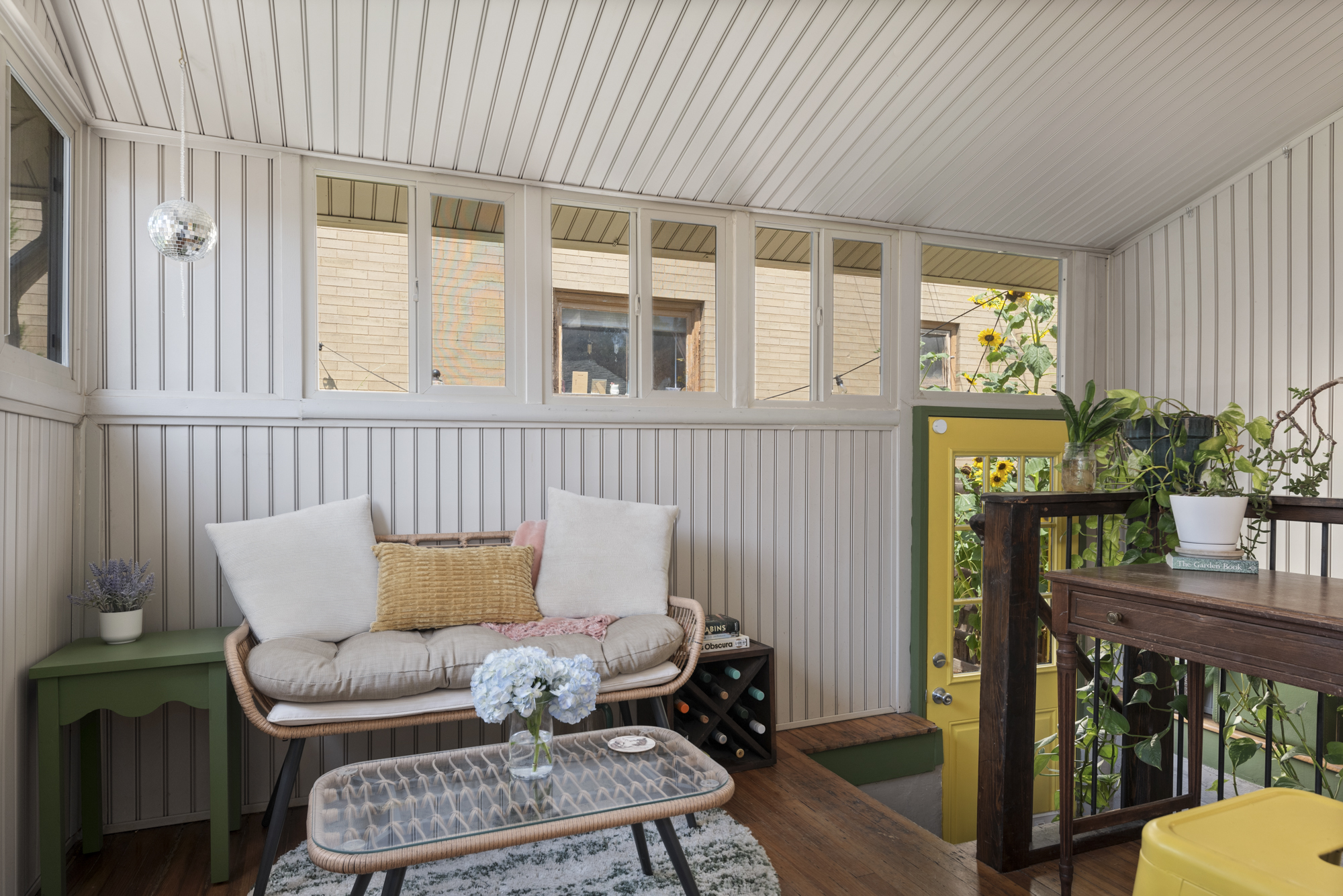 Sunroom w/ Loveseat & Desk