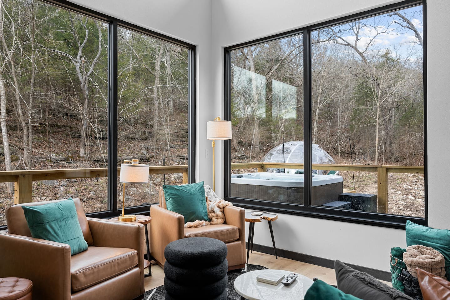 Living Room: Abundant natural light highlights chic seating and scenic views through expansive glass windows!