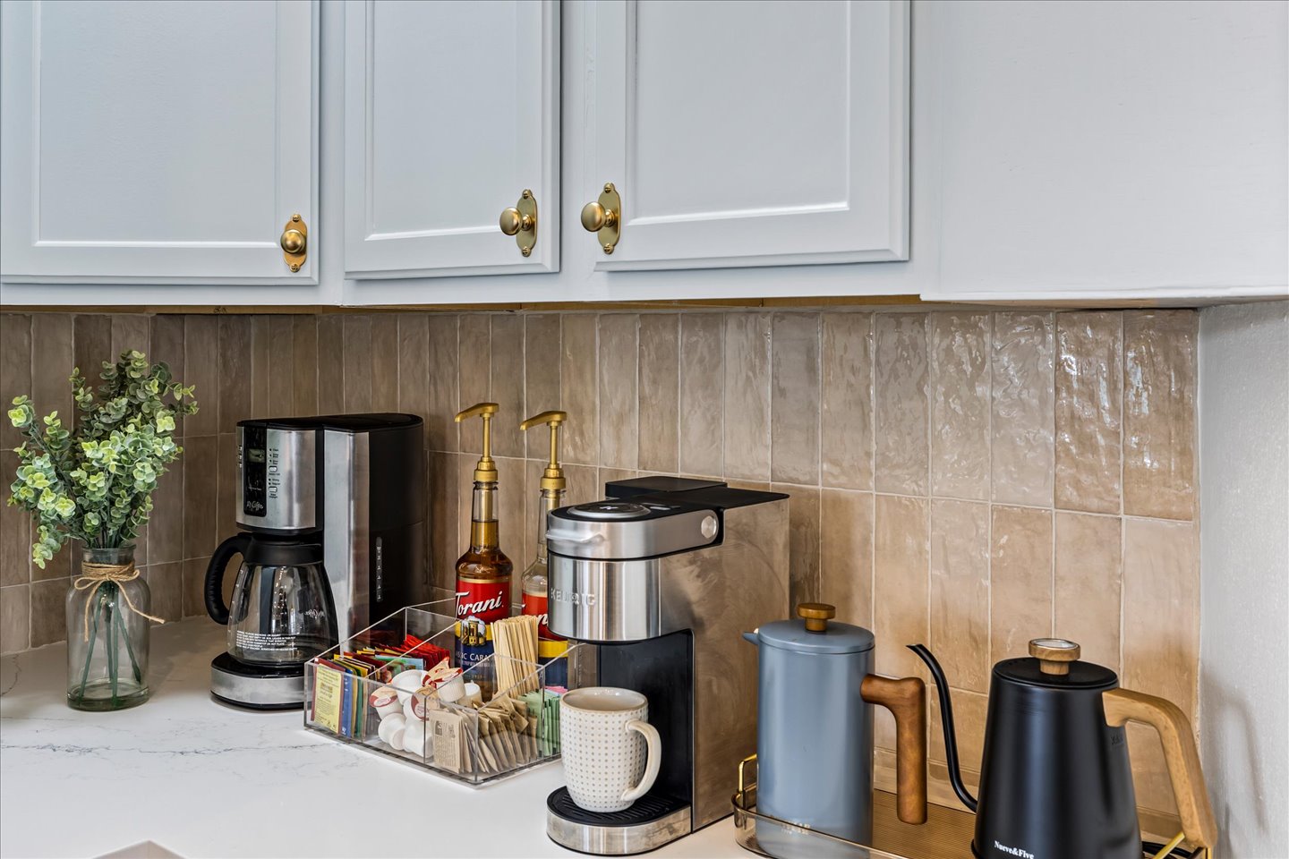 Your choice - Coffee or Tea! Drip coffee pot, Keurig, teas, tea kettle, plus Torani syrup, sugars and creamer.