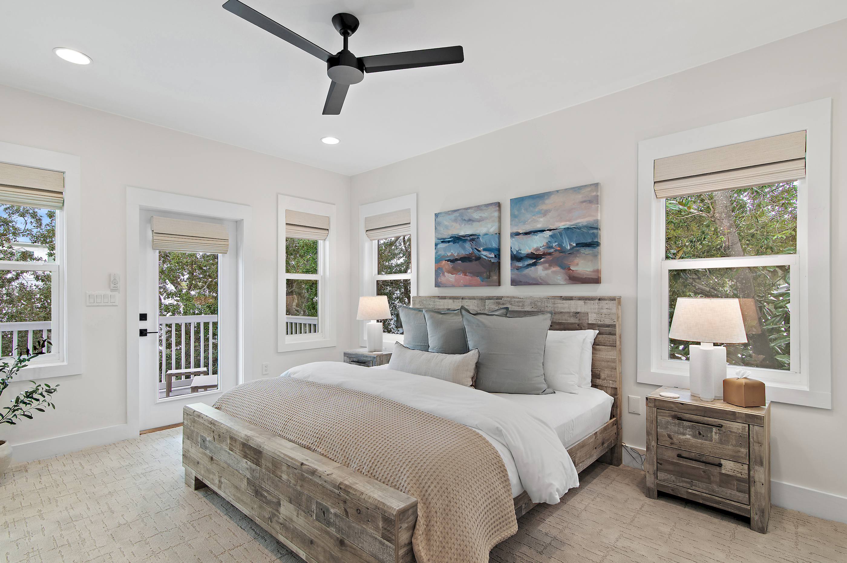 The 2nd Floor Primary Suite mirrors the first floor primary suite.  This oversized room offers a luxurious king bed, large closet, dresser, smart TV, ensuite bath, and private access to the 2nd floor rear porch.