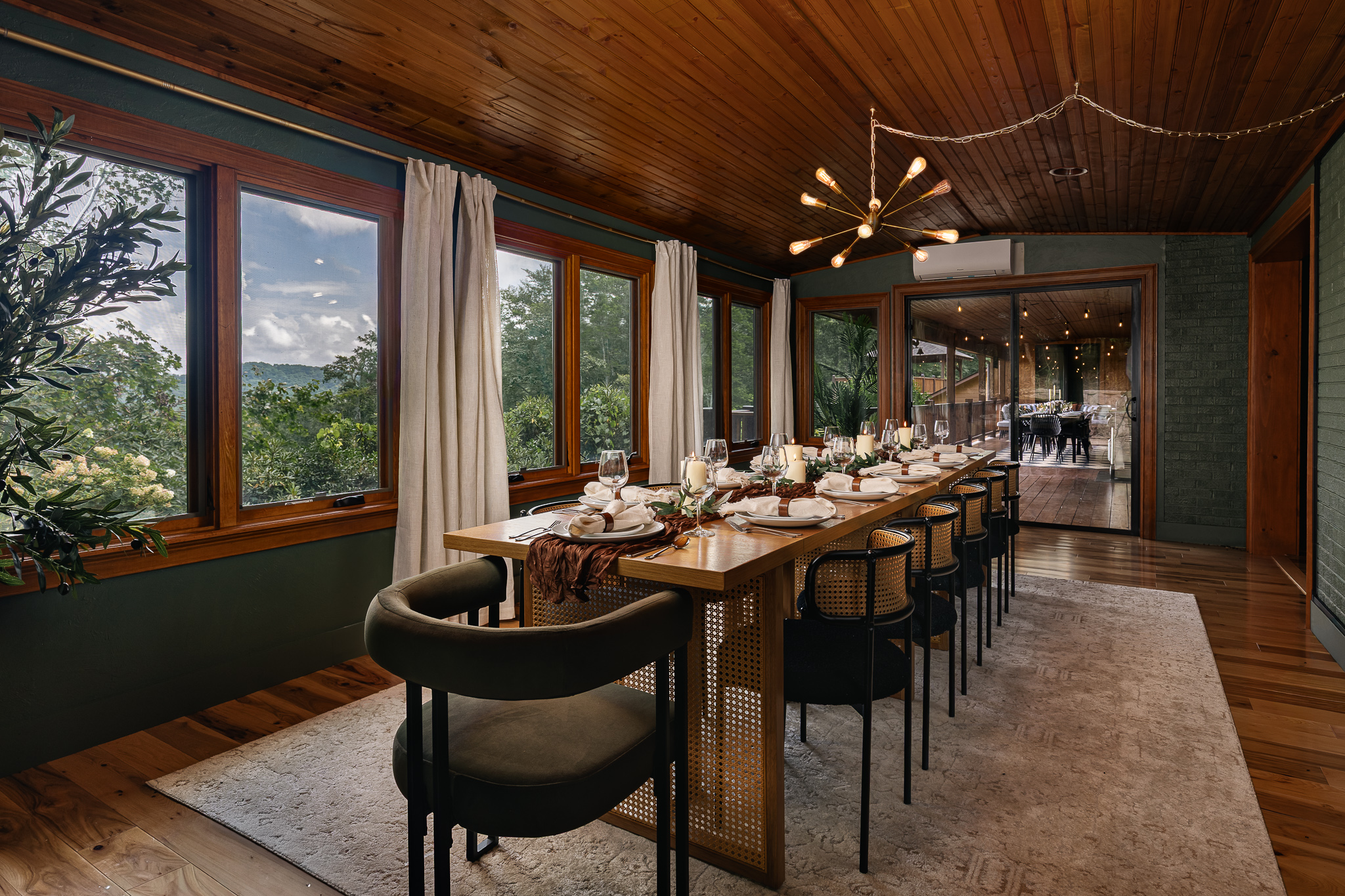 {Dining Room} Long dinners come with a view here, with seating for up to 16 and Blue Ridge scenery stretching beyond the windows.