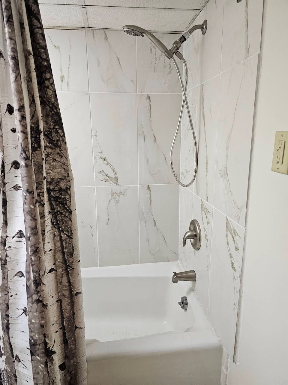 Bathroom with shower, tub, sink, and toilet