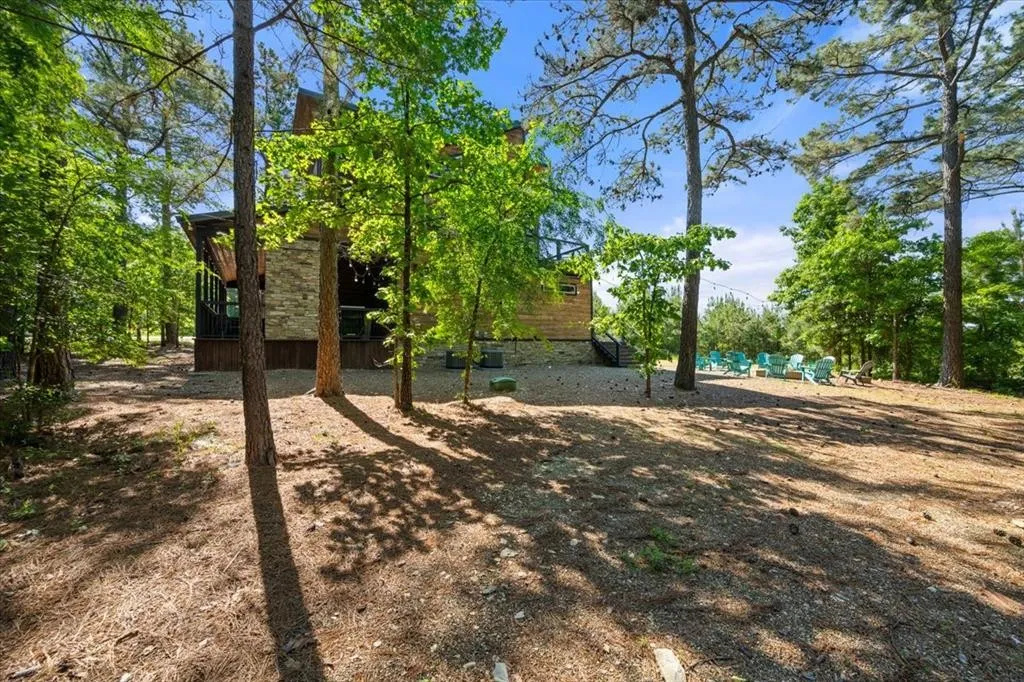 Outside open space near firepit and back deck.