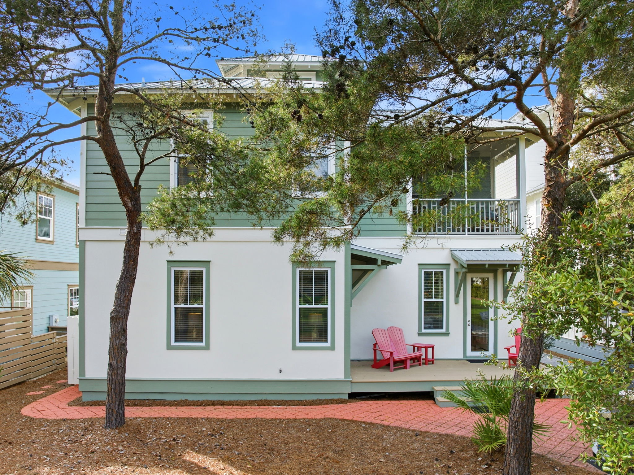 Immerse yourself in the lush, tropical scenery of Seacrest Beach neighborhood, where every stroll is surrounded by towering lush trees and coastal beauty.