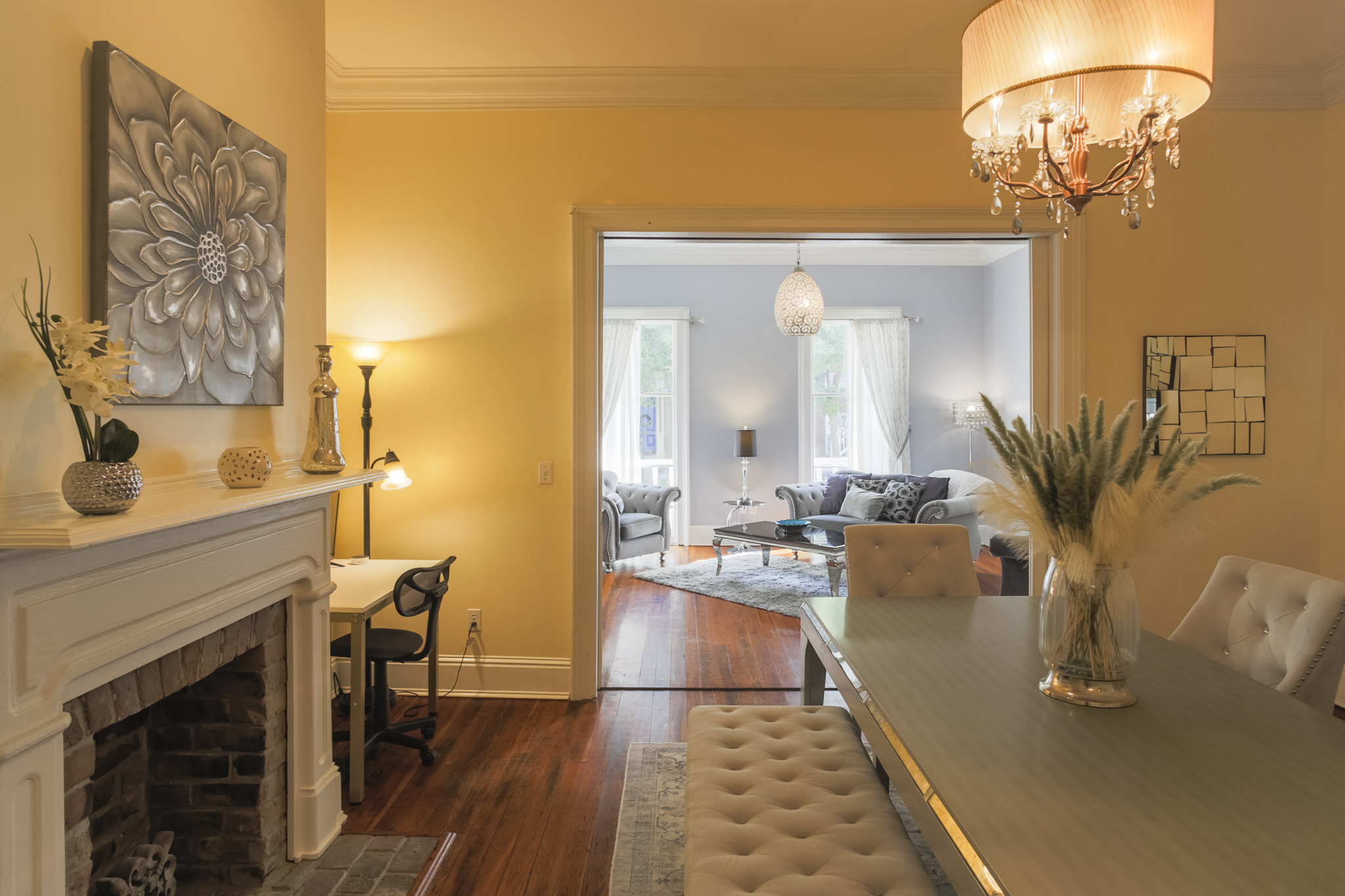 A charming bench adds a casual touch to the dining space, making room for everyone.