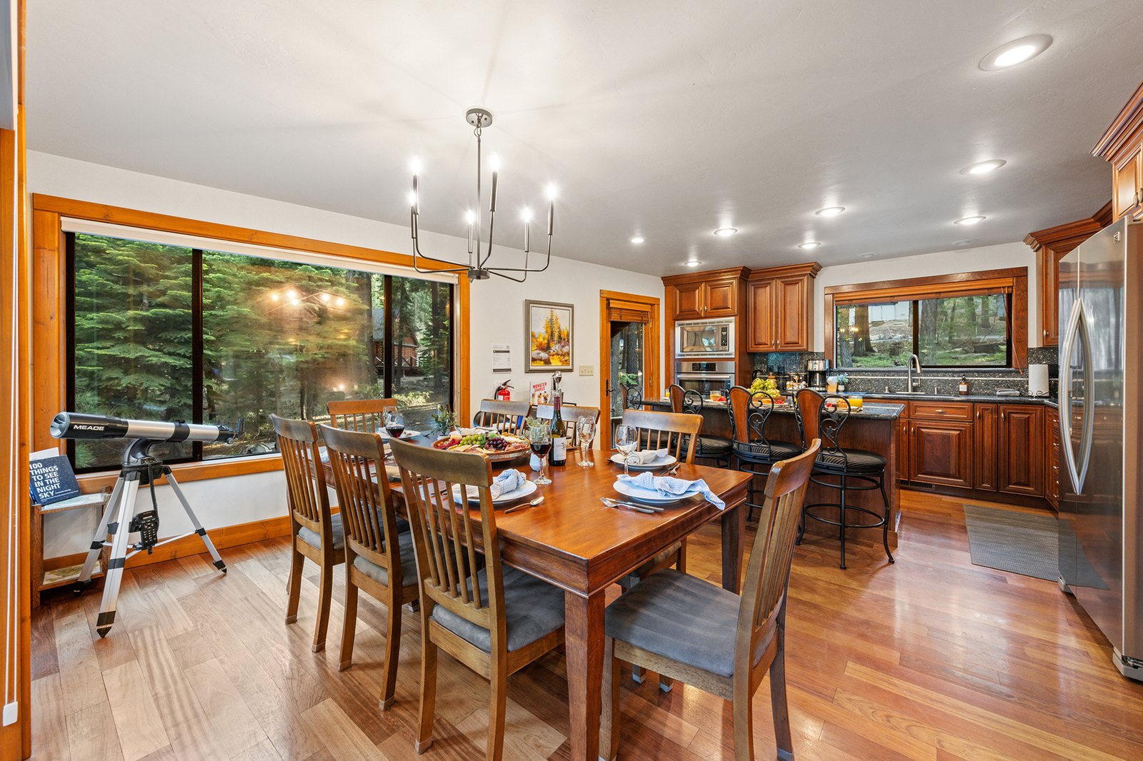 Seat eight at the table with the kitchen right behind you — and a telescope by the window for when the stars come out.