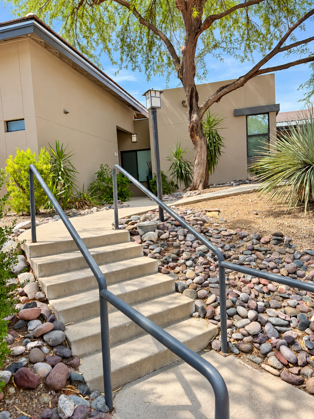 Landscaped Area Stairs to Unit