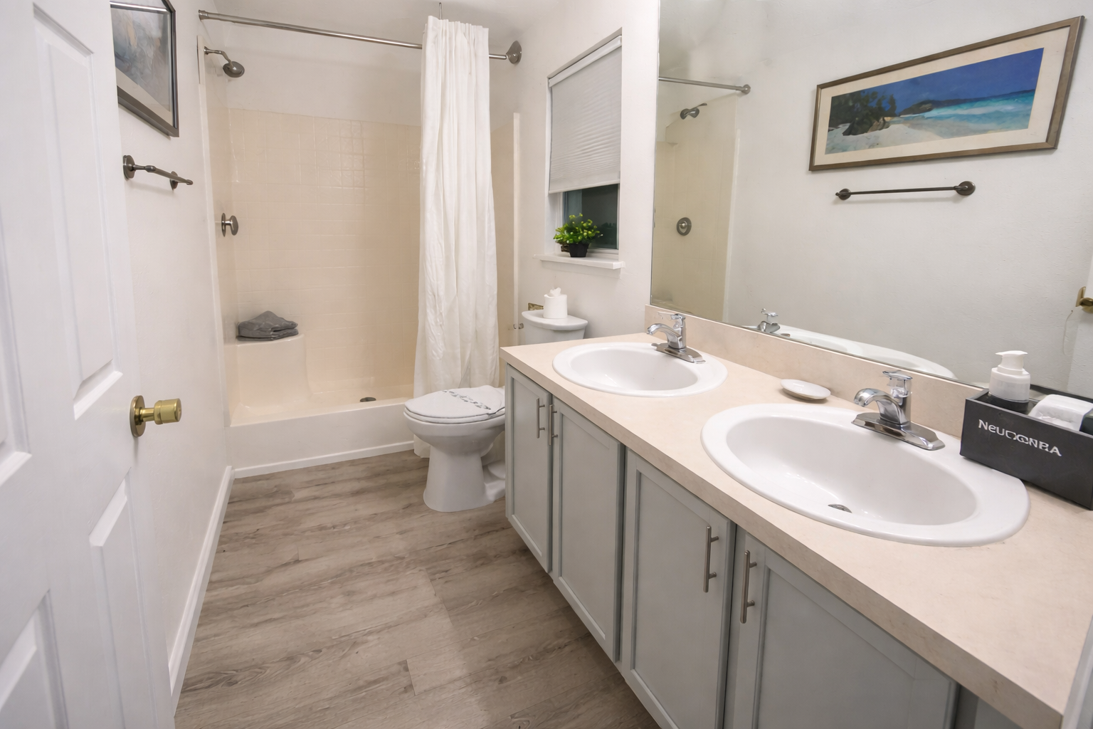 Master En-suite bathroom with double sink and step in shower 