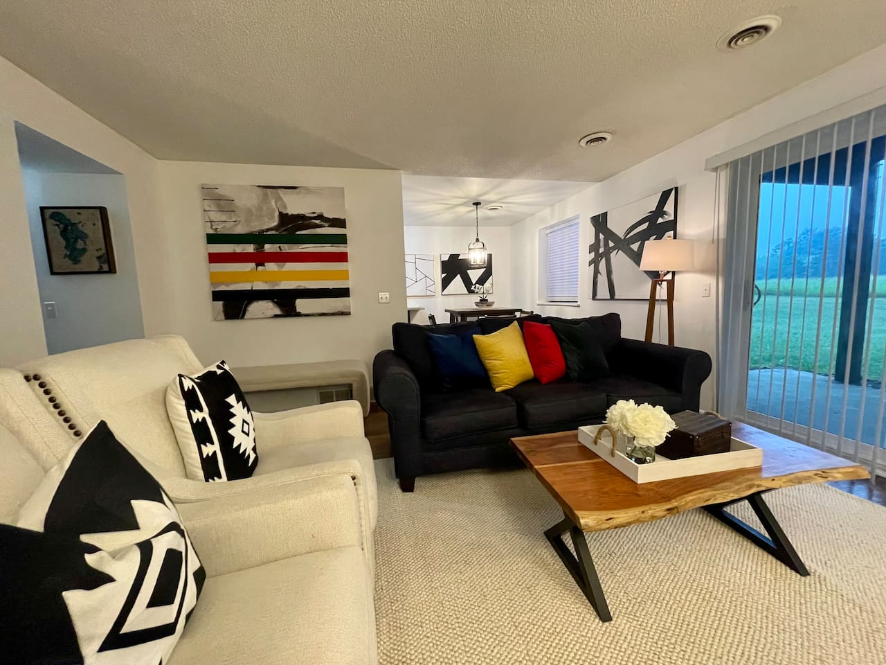 Living room view to eating area.