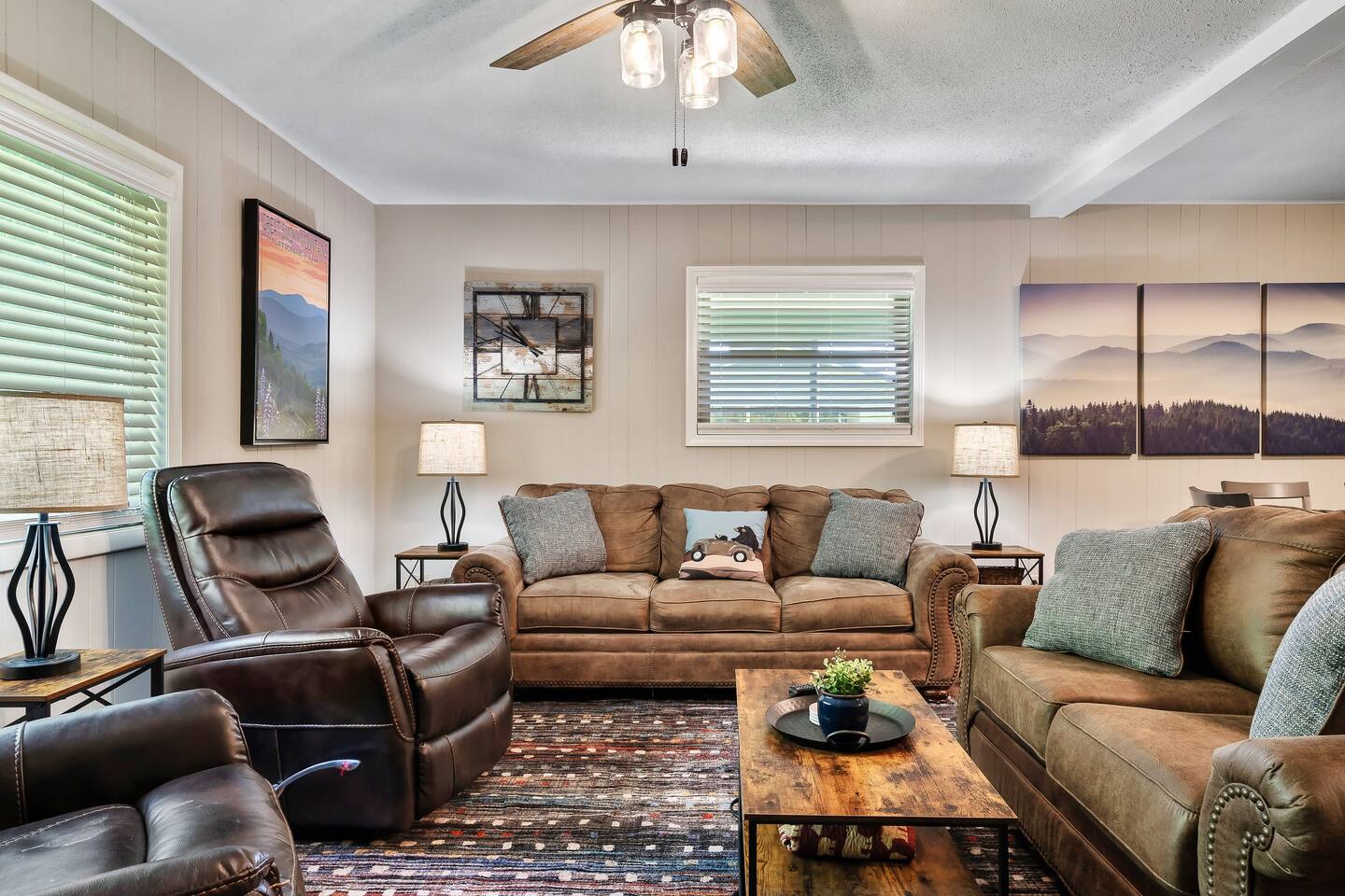 Sink into the plush, stylish seating in the living room, perfect for conversations, laughter, and creating lasting memories. #ModernMountainLiving
