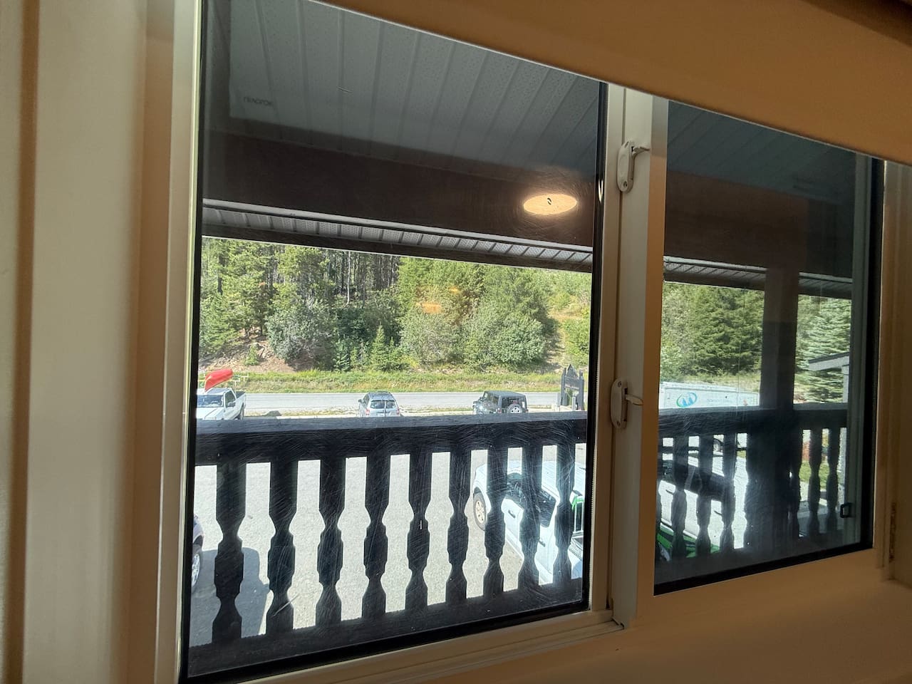 Privacy film added to the main floor bedroom so you can enjoy the view without sacrificing privacy. The room also has a blind to ensure absolute privacy when desired. 