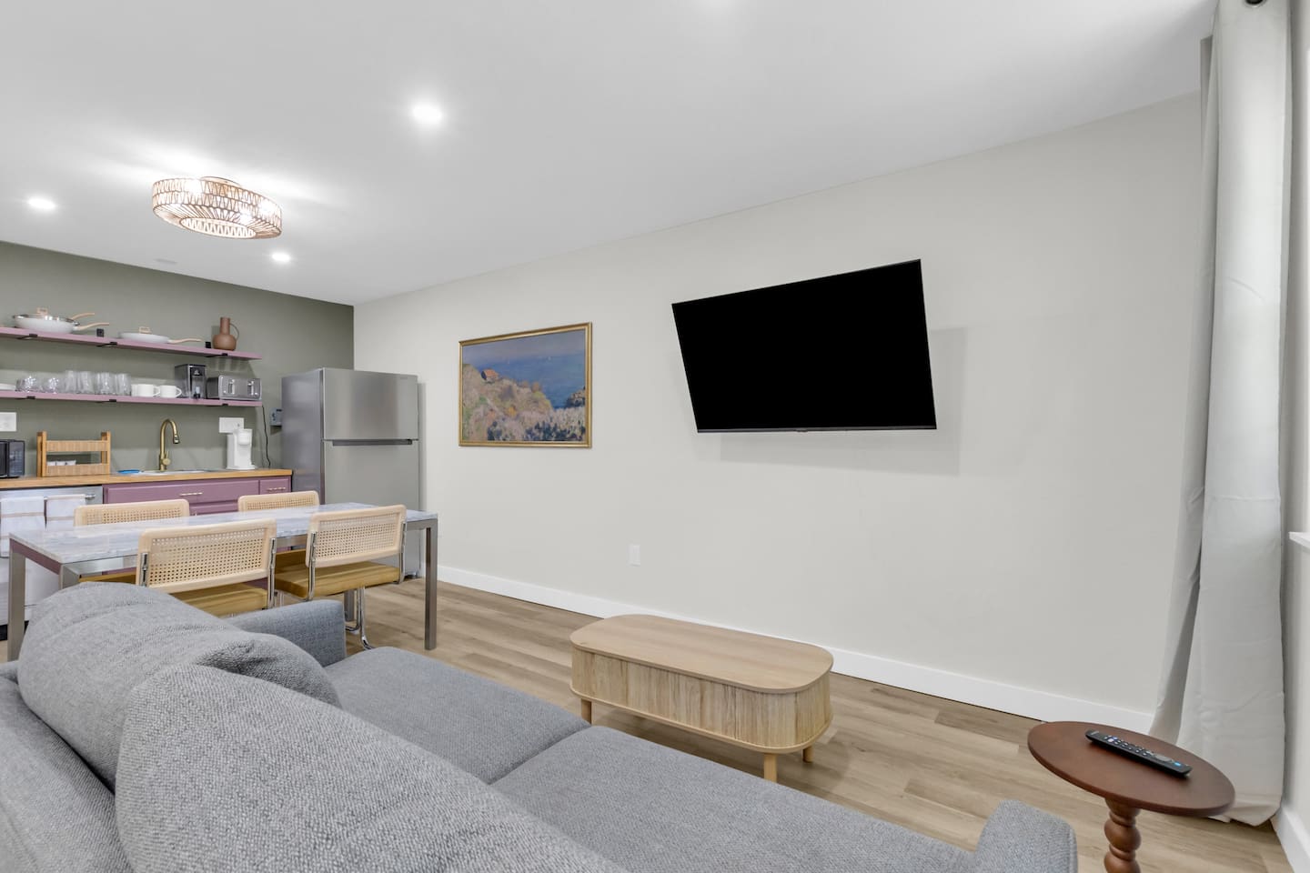 Experience this large 500 sq ft studio with an open layout, king bed, full kitchen, and cozy lounge area for relaxing or streaming your favorite shows.