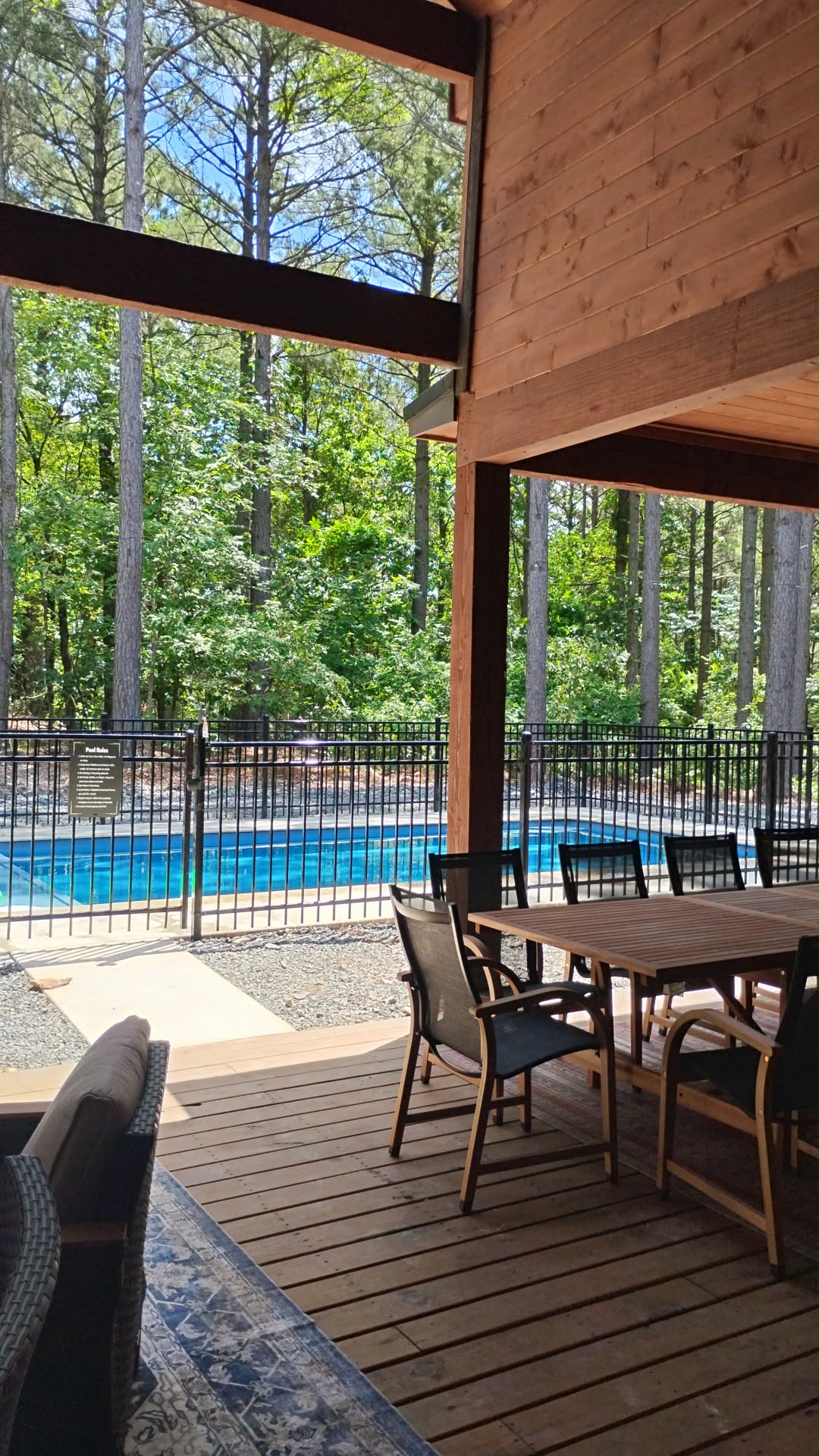 Newly completed 14' x 29' heated pool, open year round and designed for relaxation and fun. Surrounded by towering pines, the pool ranges from approximately 3 feet to 6 feet deep, making it perfect for both lounging and swimming.