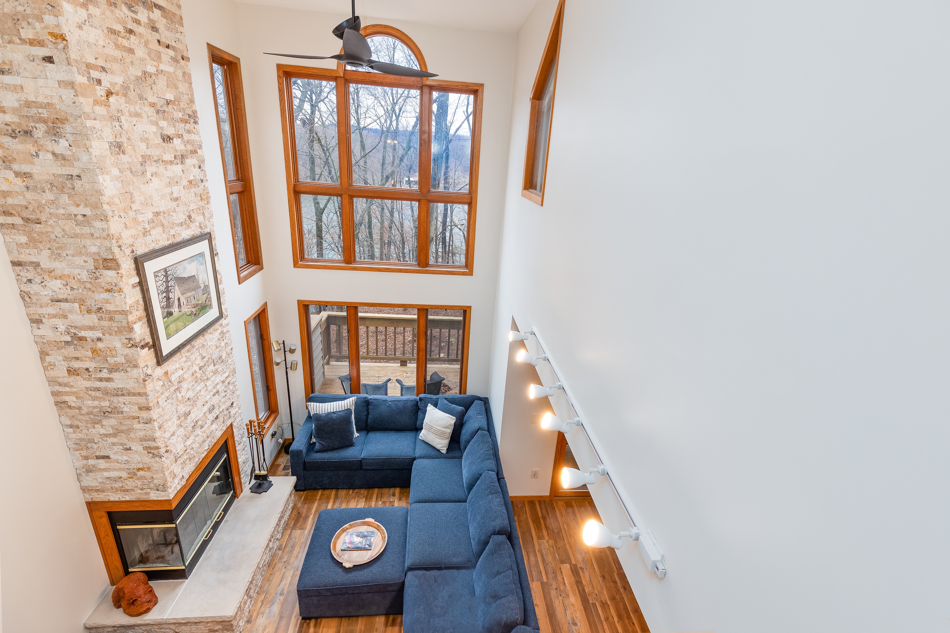 Plentiful light streams through these double-height windows in the living room