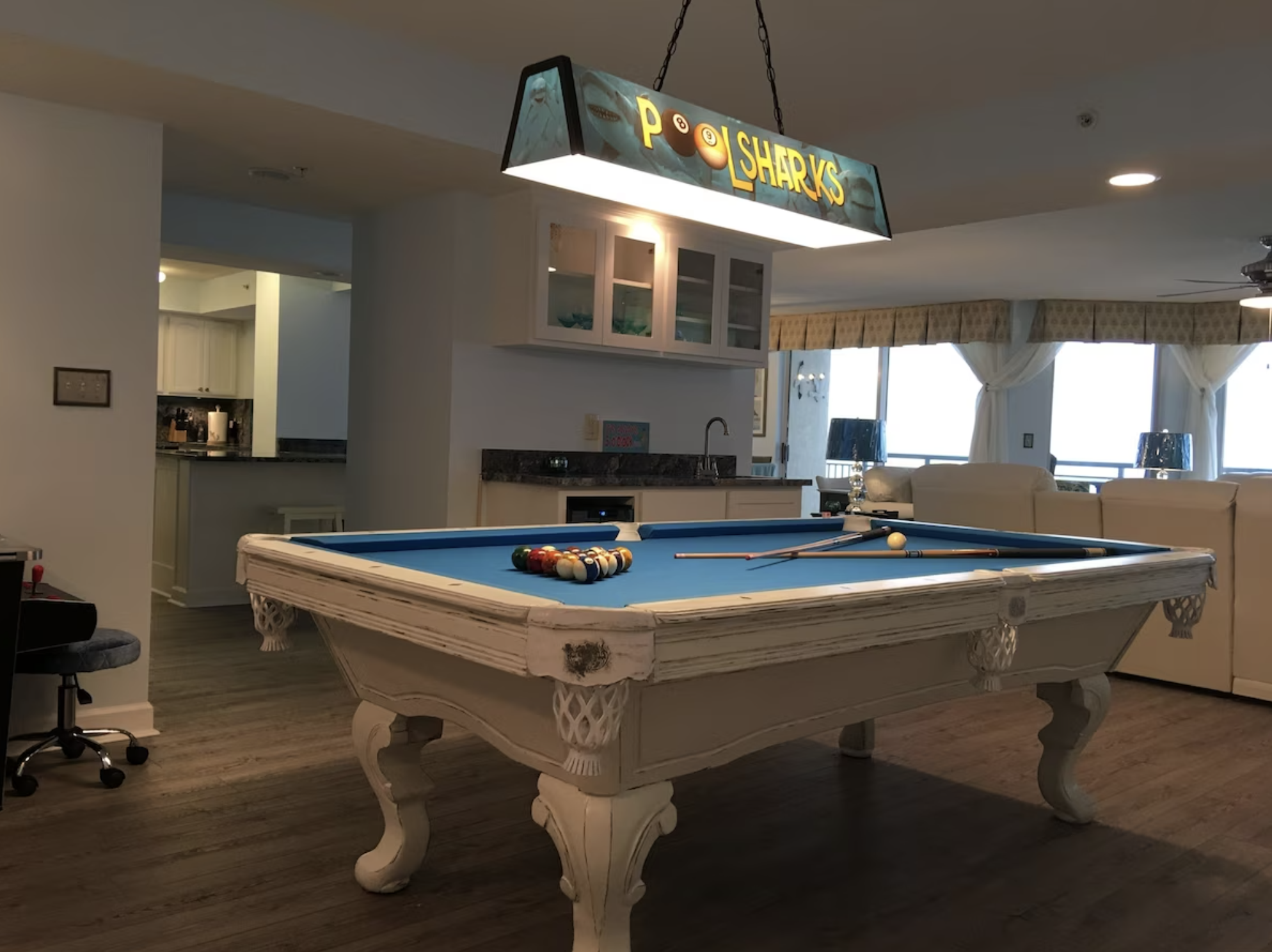 Poolsharks will have a great time making bets at the billiard table!