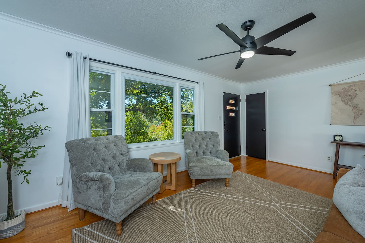 LR - big cozy chairs- use kit/ LR entrance remote for overhead fan & light operation. TV remote on side table.