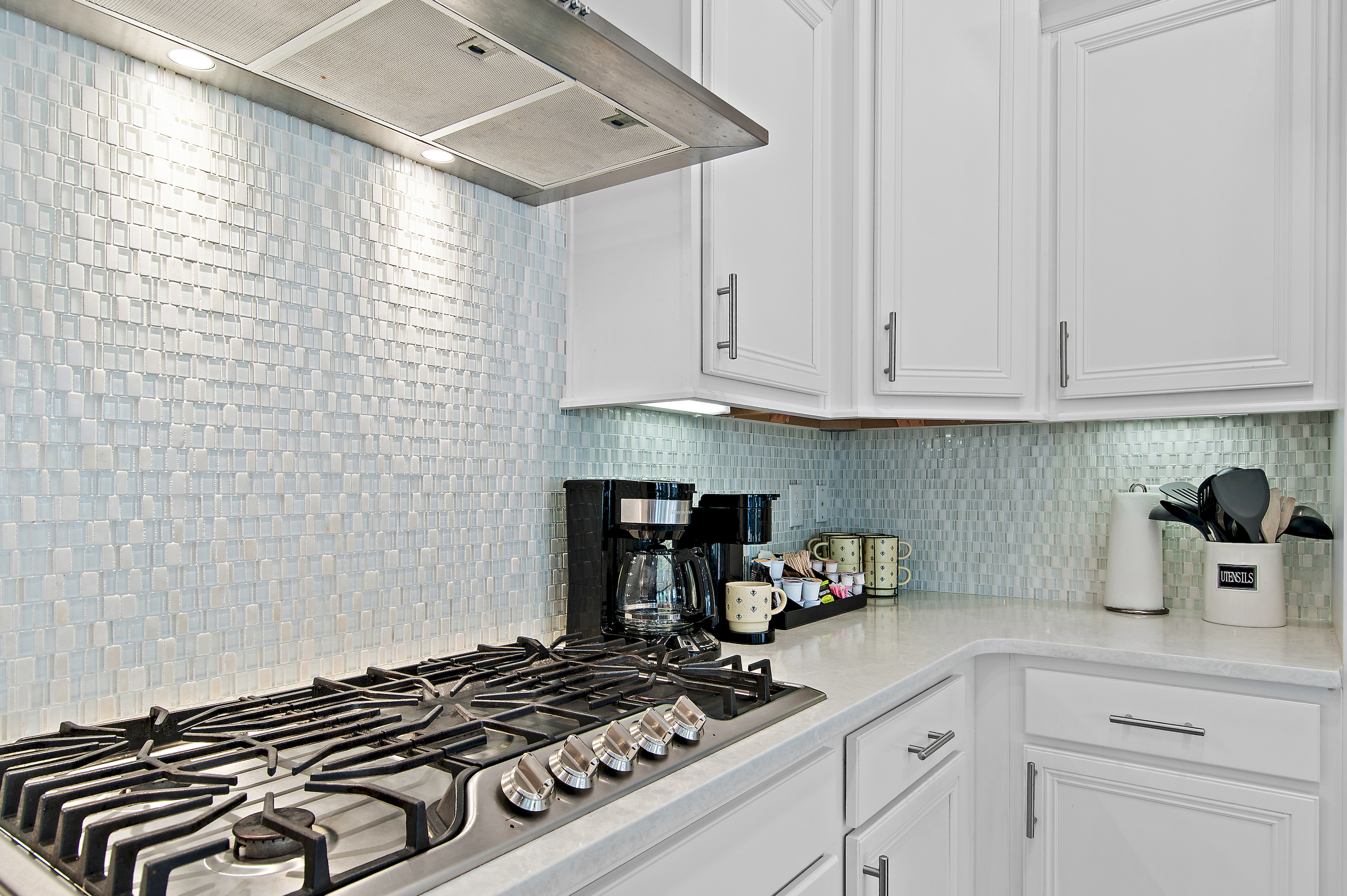 Our fully equipped chef’s kitchen features a 5-burner stove, a generous selection of pots and pans, and all the kitchen essentials needed to prepare delicious family meals.