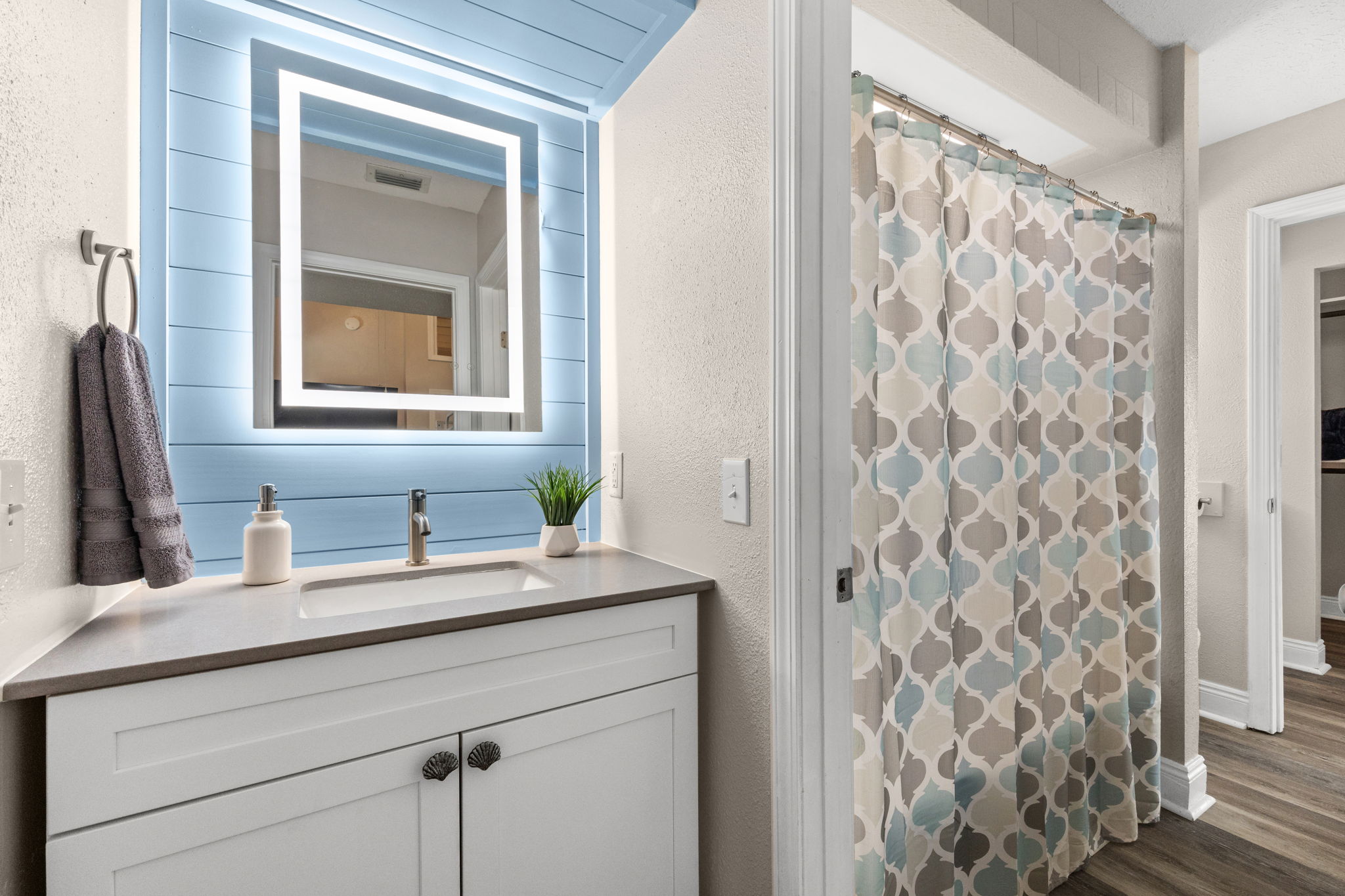 Spacious bathroom with attached closet
