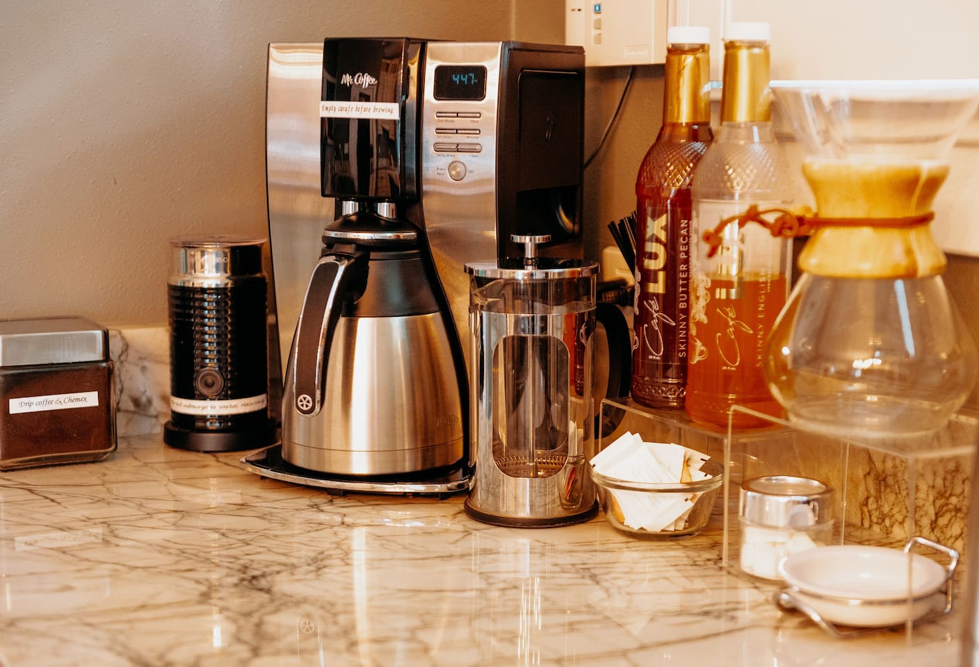 Coffee Lovers Dream! Four different types of brew. Drip, Chemex, French Press & Keurig. Mix-ins & frother  to top off your morning brew.  If nothing here is to your liking, Extra Fine,  a fabulous bakery and coffee shop is directly across the street.
