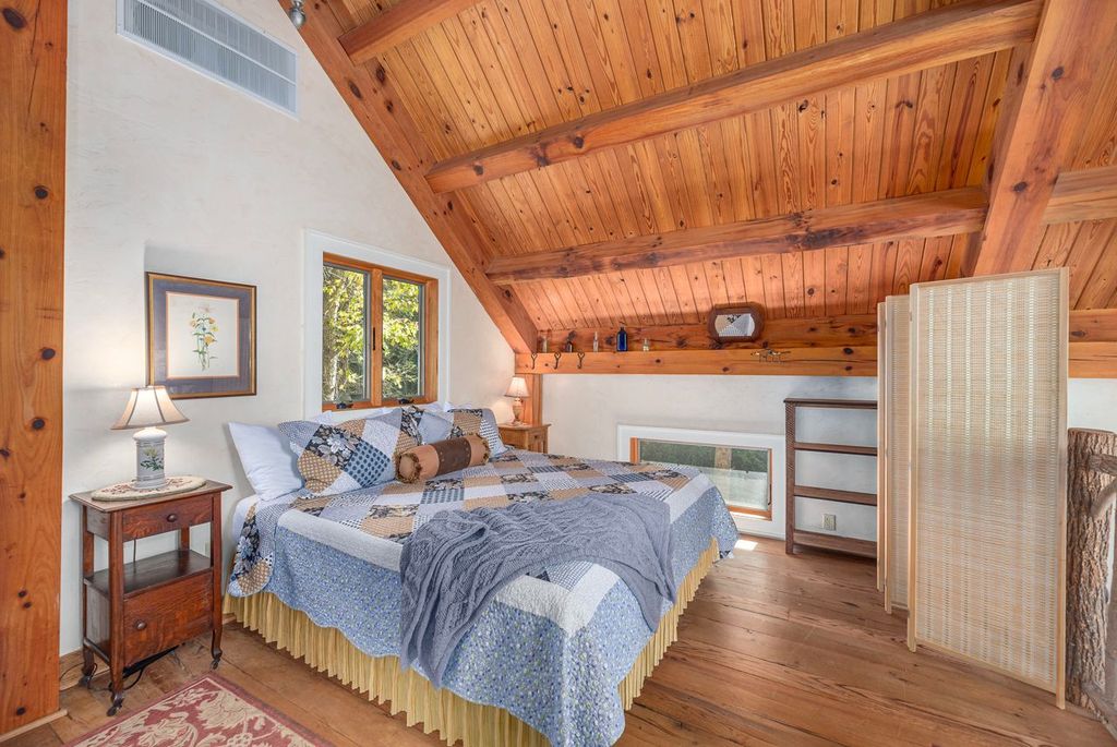 From the bed you can gaze out the window to watch Spring Creek flow by below. 