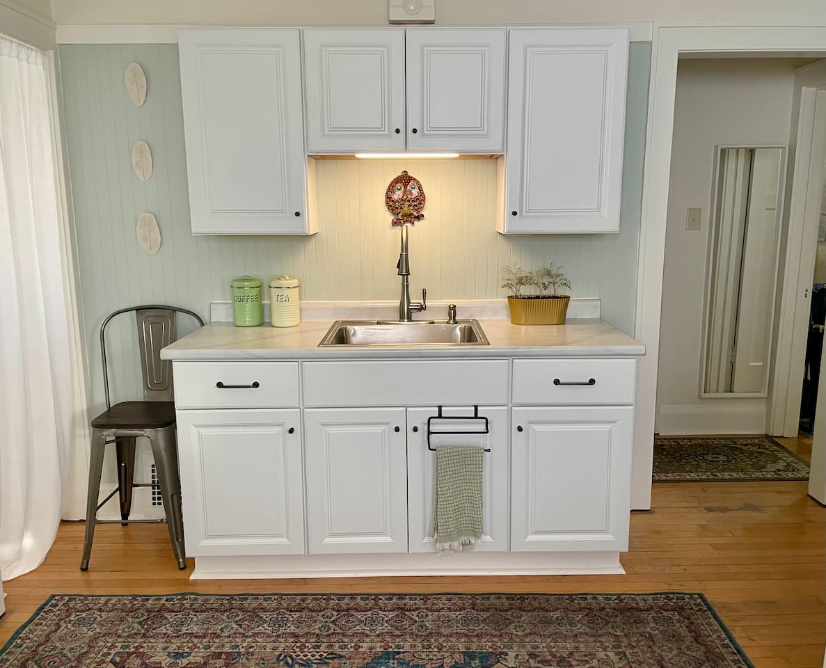Charming kitchen with classic cabinetry, warm details, and a comfortable, easy-to-use layout.