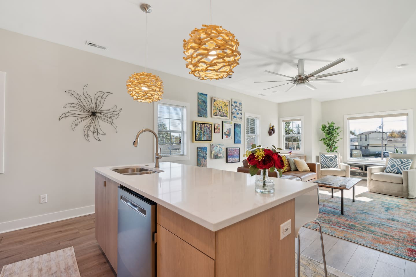 Beautiful gallery wall art (some from local artists) make this space cozy and vibrant. 