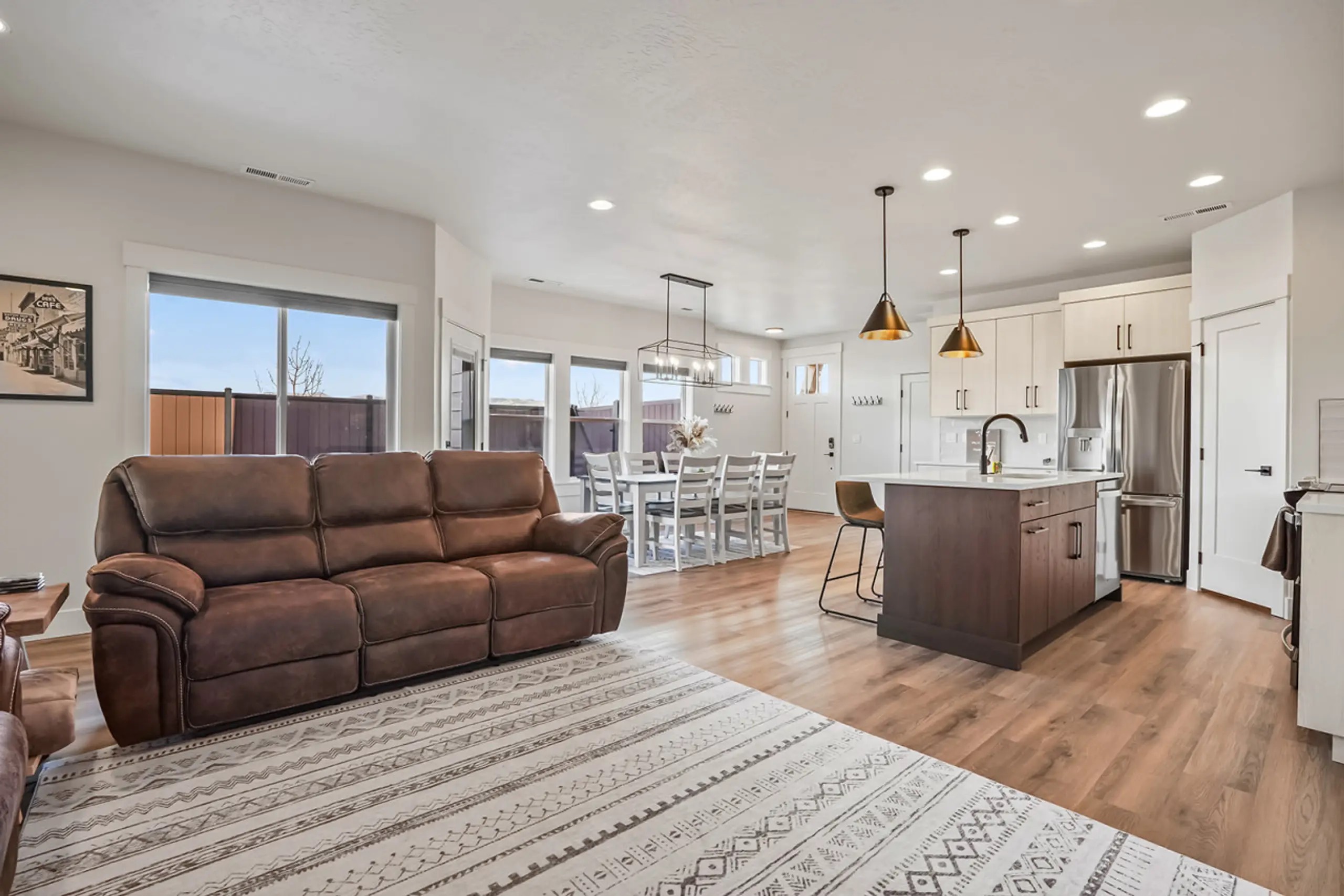 Relax on the cozy sofa in our bright, open concept home.