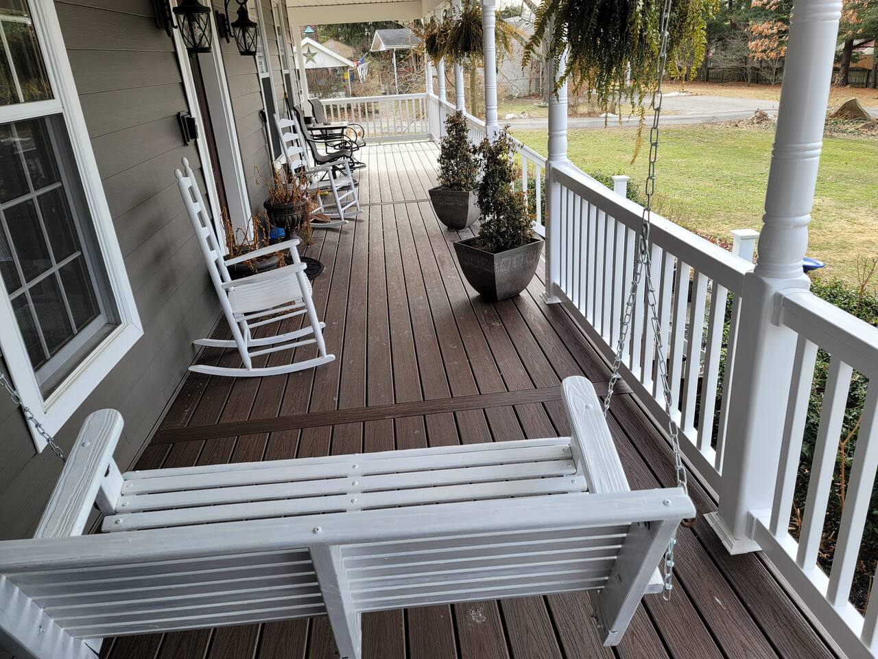 Front part of wraparound porch from side of house view 