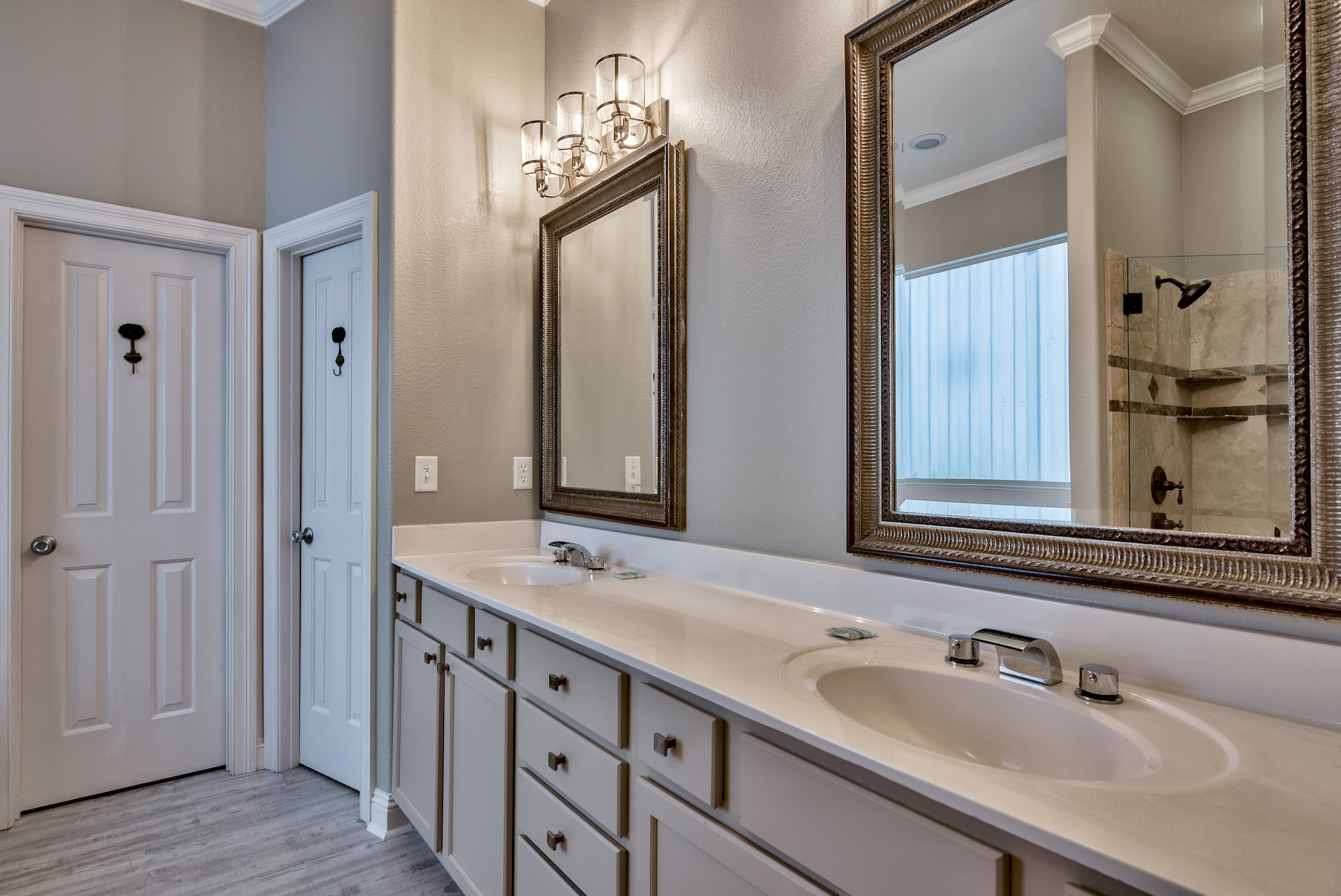 Master Bath with walk-in shower, jacuzzi & twin vanities