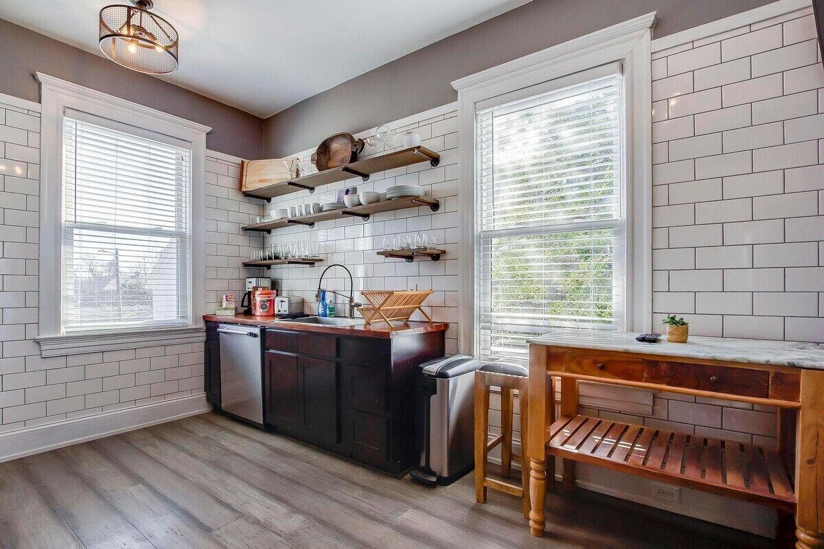 The massive historic Bonnycastle Villa is within walking distance of some of the area's best boutique shops and local restaurants.  Features 2 separate living spaces, 2 kitchens, huge dining bourbon tasting and game room, 6 Bedrooms, including 2 king beds!