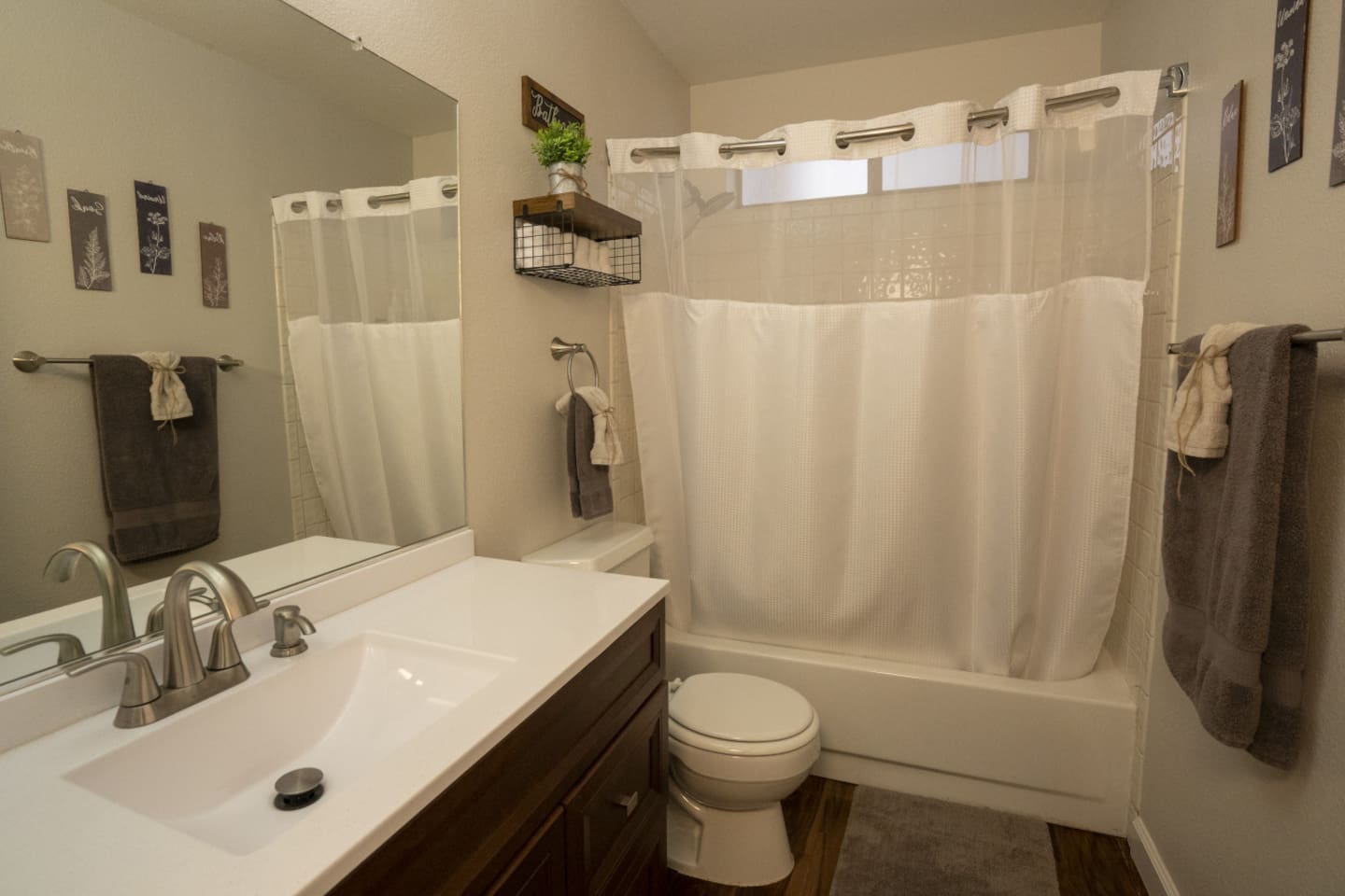 Bathroom with practical storage, fresh towels, and everything needed for simple daily routines.