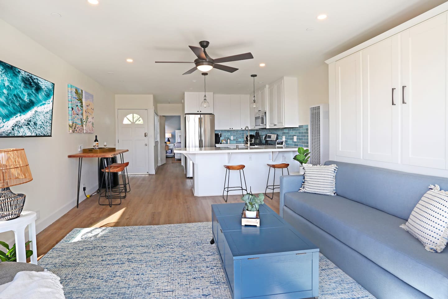 The living room includes a king-sized sofa Murphy Bed that converts to a "real bed" in less than one minute.  The bed is made up with bedding ready for sleep.  This murphy bed makes this 1 bedroom condo feel more like a 2 bedroom.