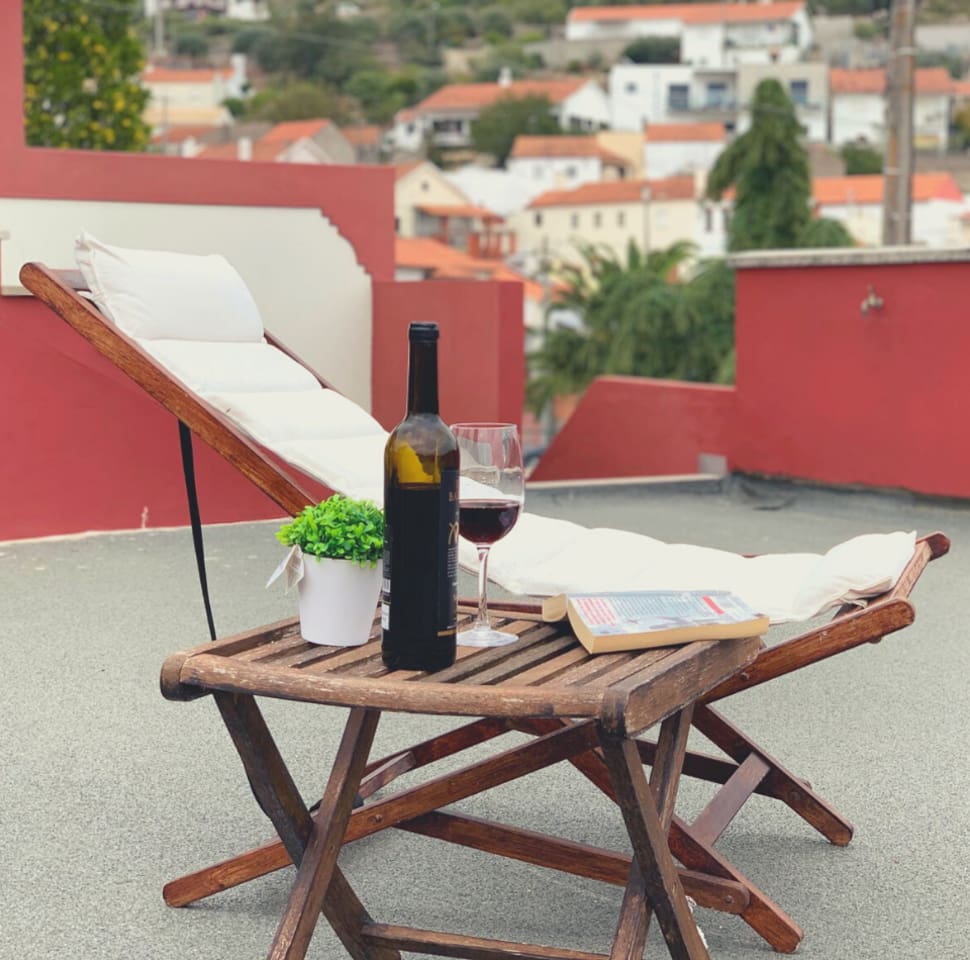 Relax With A Glass Of Wine on our roof top patio