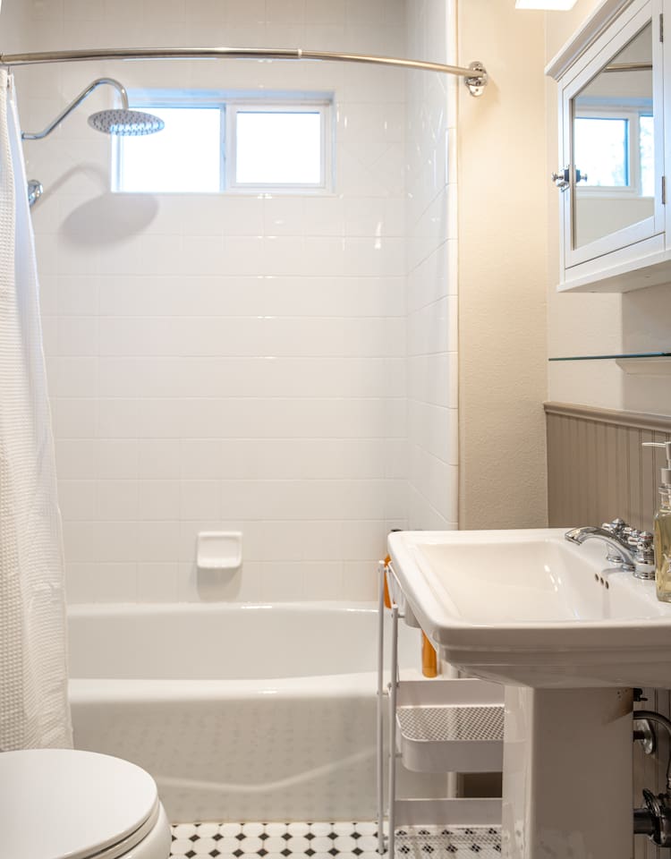 Recharge and relax in our inviting guest bathroom.