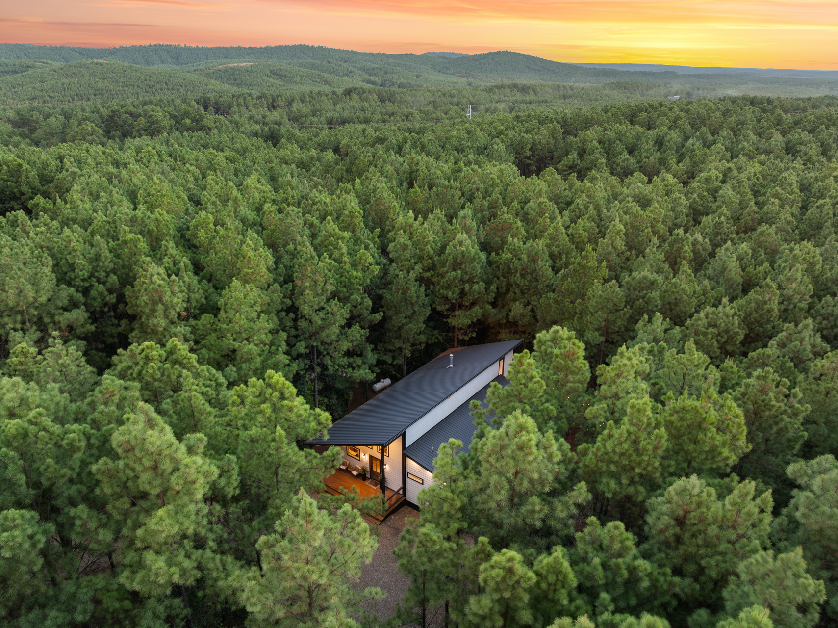 Wrapped in a canopy of towering pines, Cedar Stillness feels tucked away and secluded, giving you the quiet of the woods while keeping Hochatown just minutes away.