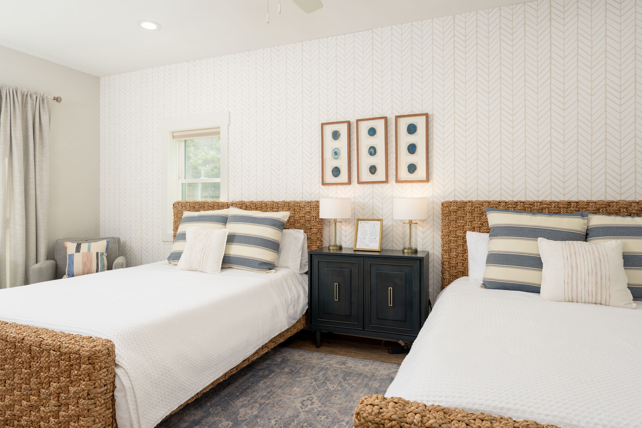 Spacious first-floor guest suite with two queen beds — ideal for families, couples, or multi-generational stays.