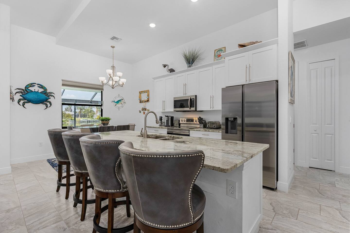 Indulge in a culinary adventure in the spacious kitchen, complete with a captivating kitchen island that invites creativity and culinary delights