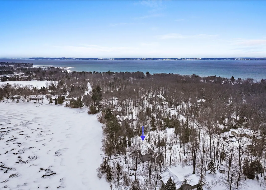 The home is located on Bass Lake in Elk Rapids but is also close to Lake Michigan, Elk Lake and Torch Lake.  