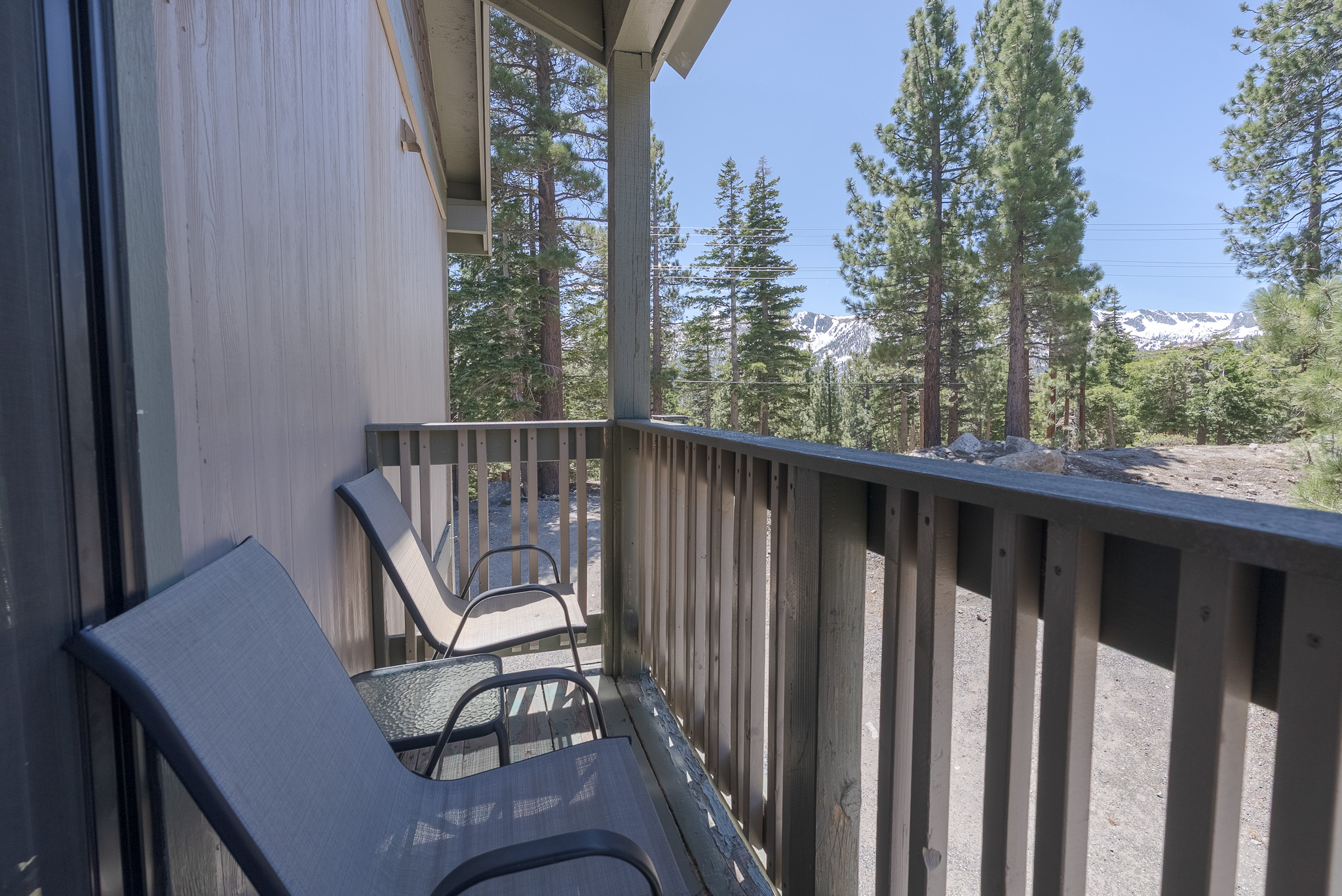 A private balcony with a view of mammoth rock is accessed through the first-floor queen bedroom.