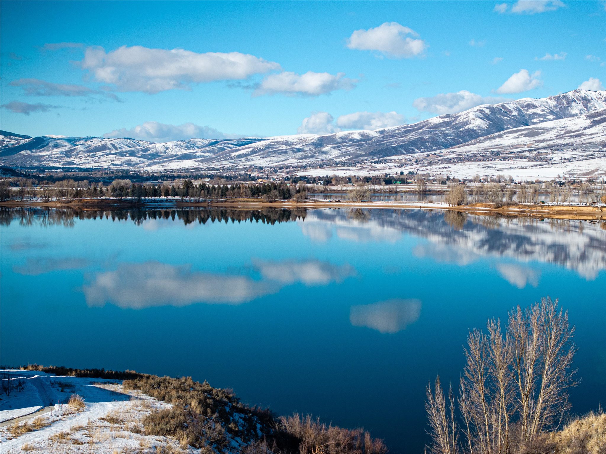 Paddleboarding & watersports with stunning mountain views.
