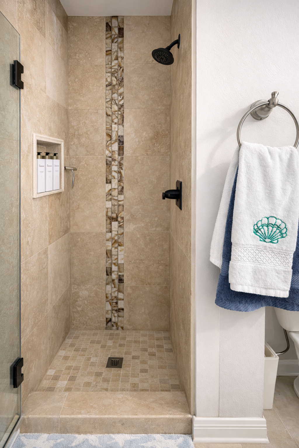 Walk-in shower with natural stone tile