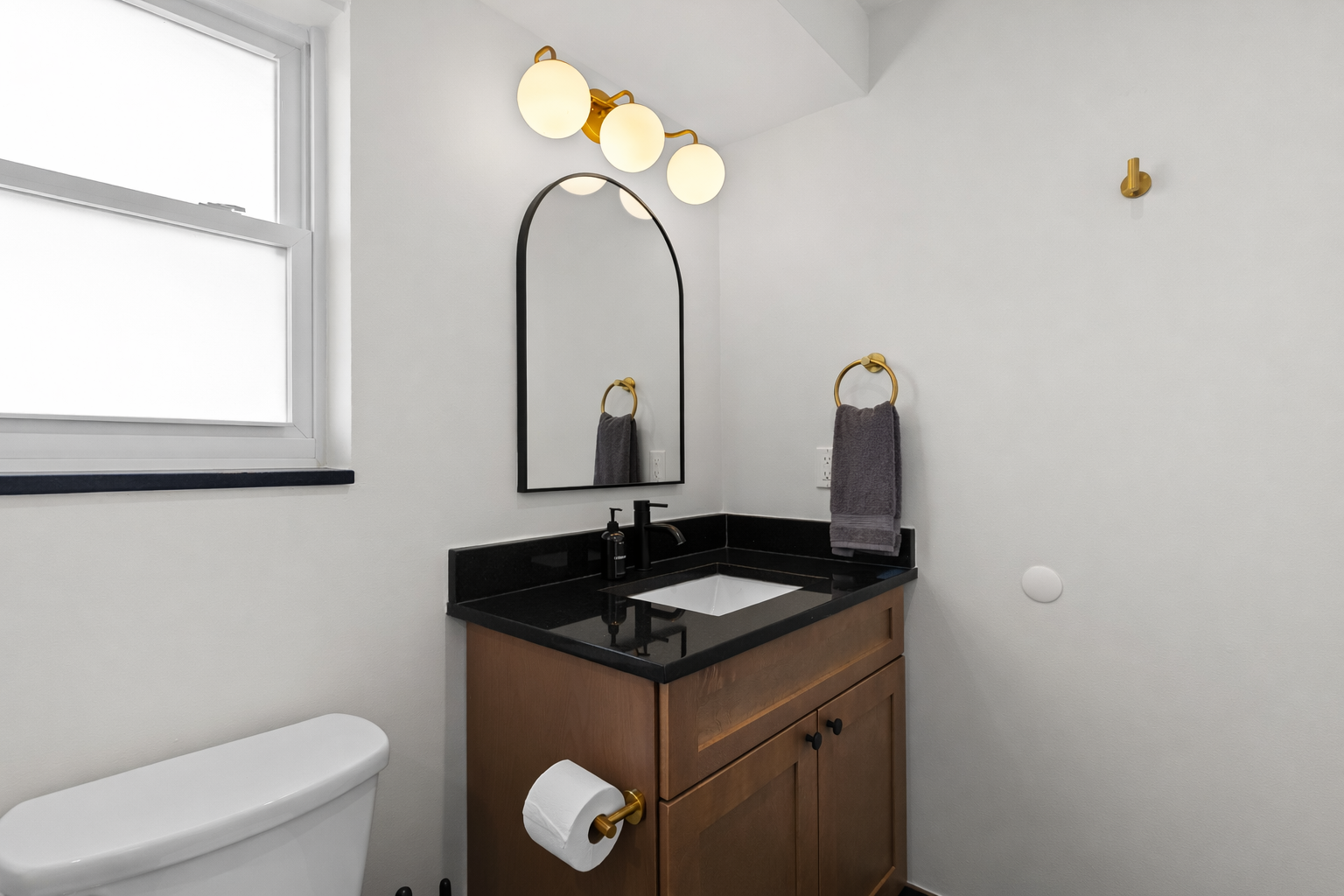 Modern vanity area with sleek fixtures, stylish lighting, and clean finishes—bright, functional, and thoughtfully designed for everyday use.