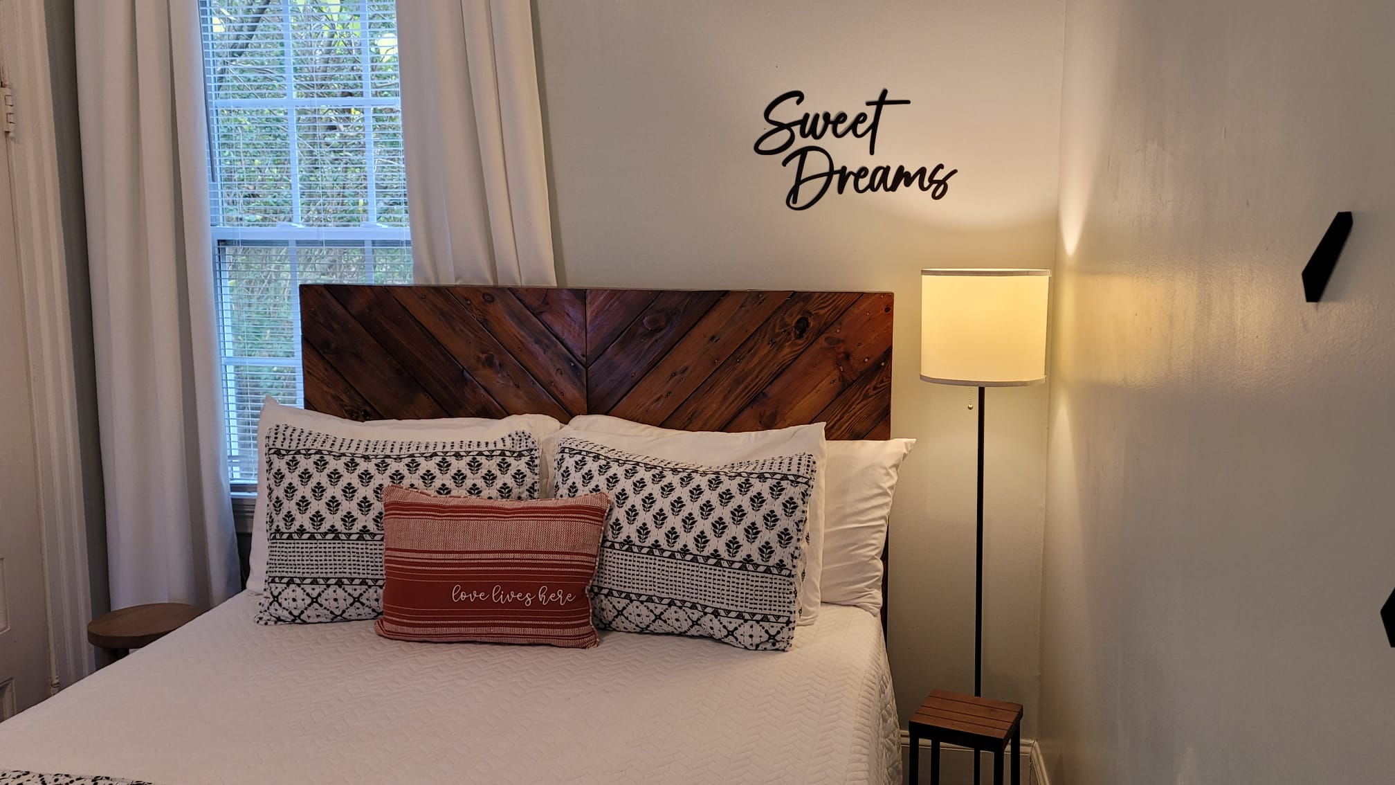 Queen bed with a custom headboard