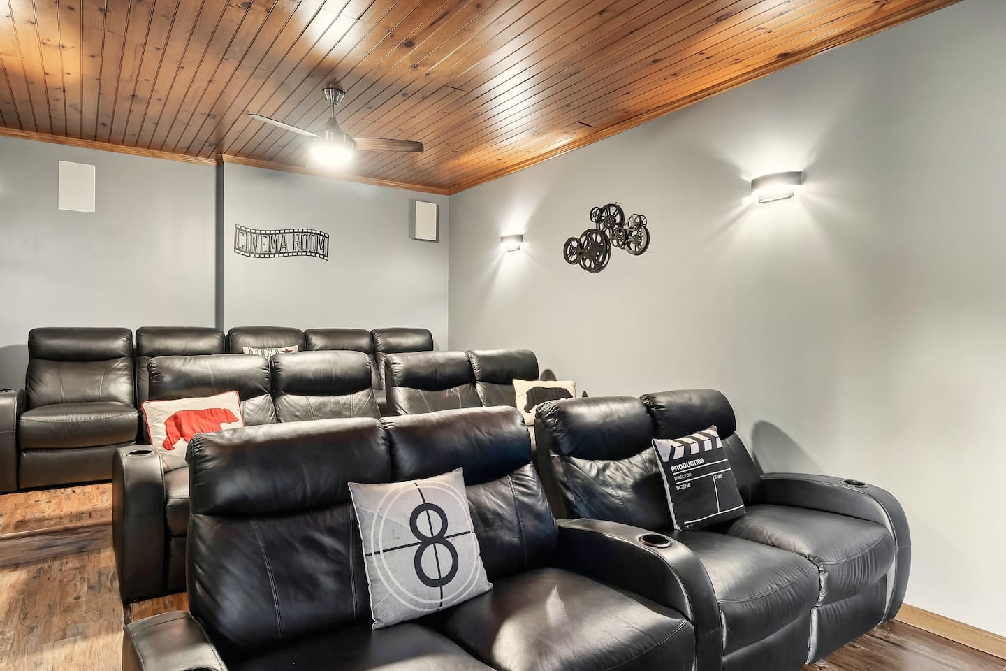 Snuggle up for movie night in these amazing reclining chairs! Private theater room adjacent to  rec room with pool table & more.